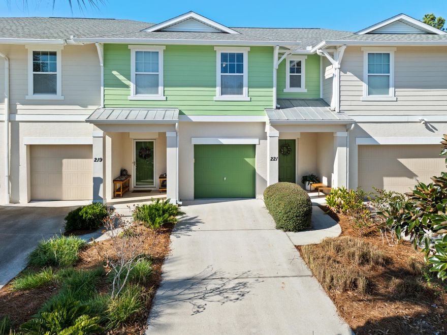 Located in the Whisper Dunes neighborhood of Panama City Beach, this furnished 3-bedroom, 2.5-bath townhome offers 1,560 square feet of comfortable, well-maintained living space with a one-car garage and private fenced back yard. The layout is perfect for full-time living or a second home. Short-term rentals are restricted.The main living area is bright and inviting, featuring durable luxury vinyl plank flooring and an open flow between the living, dining, and kitchen spaces. The kitchen includes warm wood cabinetry, stainless steel appliances, a tile backsplash, and a central island that anchors the space and provides additional seating and workspace. The adjacent dining area is filled with natural light and opens to the outdoor patio. Recent updates add peace of mind and include a new roof in February 2023, fresh exterior paint and new luxury vinyl plank flooring in Fall 2024. Together with additional interior updates the home offers a move-in-ready setting.

Outdoor living includes a private patio and fenced yard area that extends the usable space beyond the interior. The home's coastal-inspired furnishings and neutral palette complement the light-filled interiors and are included with the sale.

The Whisper Dunes community features a neighborhood pool and is just a 5 minute bike ride to public beach access 84 and conveniently located near Camp Helen State Park, Pier Park, 30Avenue, Rosemary Beach, and Scenic Highway 30A. The location provides easy access to beaches, shopping, dining, and outdoor amenities.