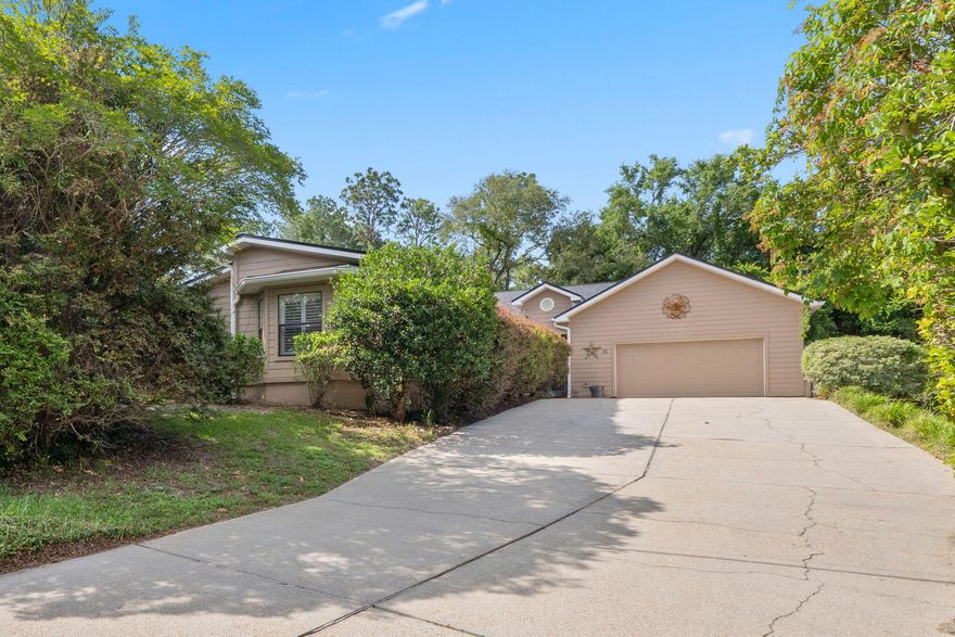 Located in the heart of the sought-after Poquito Bayou area in Shalimar, FL - this spacious 5 bedroom, 5 bathroom home in the Longwood Pines subdivision is a one-of-a-kind property - with no HOA! The perfect location for anyone that commutes to any of the local area military bases - just 3.2 miles from the West gate of Eglin Air Force Base! Inside, the home boasts generous living spaces, including a versatile great room with its own ensuite bathroom - ideal for use as a private den, office, or a fully equipped mother-in-law suite. The open concept main living area features the kitchen with granite countertops and a breakfast bar and blends into the living room that showcases a floor to ceiling brick fireplace and 3 sets of slider doors that all slide completely into the wall to open the  backyard patio space - making the most epic entertainment spot for those good weather nights - showcasing the covered, paver patio with grilling area and the in-ground spillover pool and spa that is the main attraction for this backyard oasis! The primary suite features an oversized walk-in closet, a spa-like ensuite with a double vanity, walk-in tiled shower, and a separate tub. The 4 additional bedrooms - one with its own ensuite bathroom, and two that share a Jack-and-Jill bathroom - are just down the hall. Schedule your showing today and make this unique Shalimar yours today!