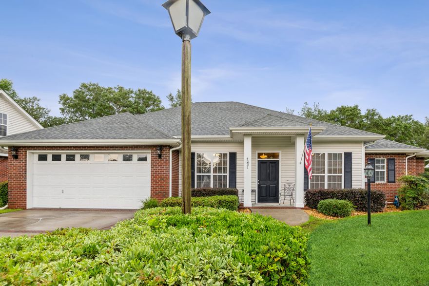 Look No further as this is the house for you!  ALL new LVP flooring (2021) (NO carpet), Split bedroom plan, newer stainless steel appliances (2019). Beautiful upscale Legacy Cabinets in kitchen & all baths. 10 ft ceilings throughout. Gated Community. Would make a great Home or rental property. Walk out your screened patio to a large pavered deck with hot tub & view of mature oak trees. Master bedroom features a large walk in closet as well as lots of storage & a jacuzzi tub. 4 full bedrooms, PLUS a Flex room that can be as a formal dining room, den, home office. Low maintenance Brick home in Flood Zone X in desireable Bluewater Bay resort area.   Join the tennis, golf & 3 Pools available in Bluewater & enjoy a resort life-style