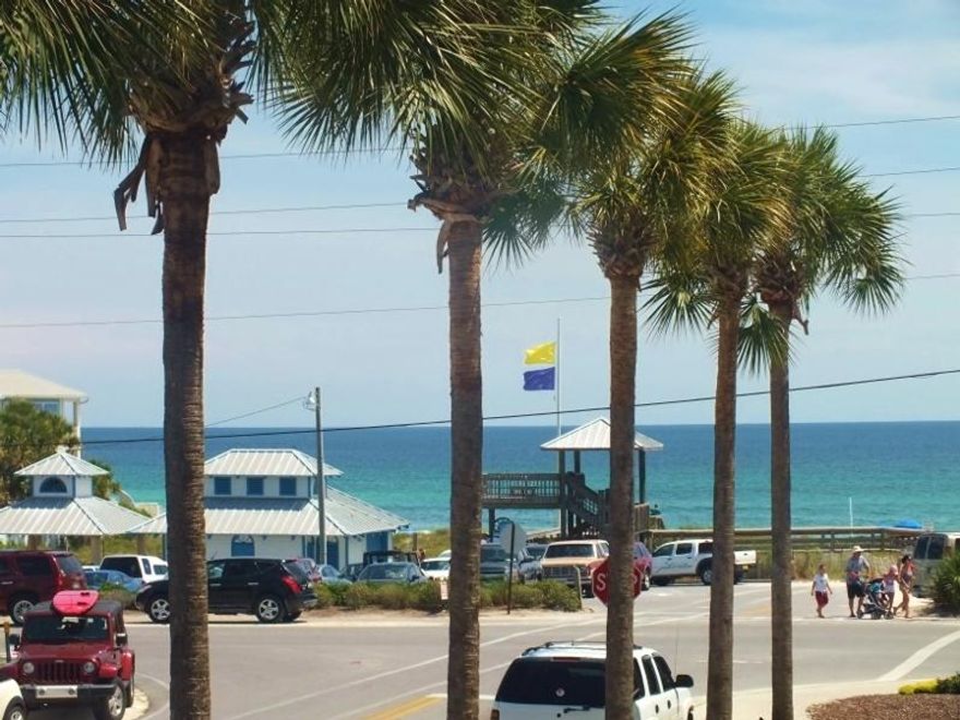 Great price for this location on scenic corridor 30A, and best price for this floor plan at the Inn at Gulf Place! Located across from the beach with a great gulf view corridor from the balcony and dining area. Note that views are below the palm foliage with a sense of being closer to the beach. This one bedroom sleeps 4 with sleeper sofa, and features, high ceilings, a full kitchen, tile flooring throughout, and a spacious bathroom with garden tub. Kitchen is expanded to allow more cabinet and counter space than you will find in any other condos currently listed in Building 4. Kitchen also features a dishwasher-a rare addition in this building! Owners and renters here have access to three pools, hot tubs, and tennis courts. So many boutiques and services to enjoy in Gulf Place!