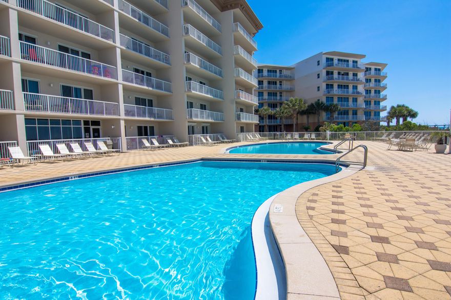 $40-45K rental history! The beach getaway you've been dreaming of... a 3 bedroom, 3 bath rental machine at Summer Place with seaside inspired interiors and beautiful Gulf front views. Sunshine and warm gulf breezes and views abound from the balcony, accessed from both the living room and the master suite. The gourmet kitchen features granite counters, loads of cabinet space and is fully stocked and rental ready. Upgraded tile floors throughout - no carpet! Enjoy the good life at Summer Place with resort style amenities including: 2 Gulf front swimming pools (one seasonally heated), hot tub, fitness center, lush grounds, bbq grills and of course the beautiful beach just steps from your door. This condo has a 5 star VRBO rating with a long history of happy guests.