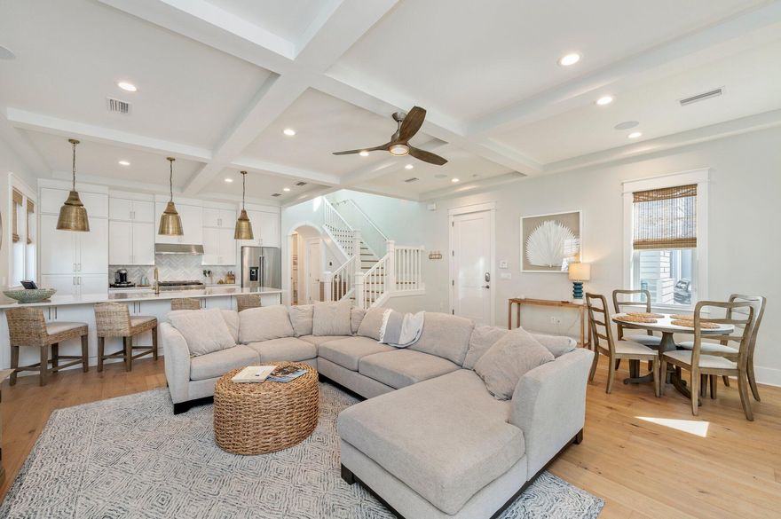 Nestled in a quiet, gated enclave surrounded by protected nature preserves sits this former-model home where builder spared no expense. Just a short walk or bike to the sugar sand beaches of 30A, this home has been owned only as a second residence (never rented and community does not allow short-term) and is like-new. Coveted *master on main* design with spacious upstairs boasting flexible loft space and 2 bedrooms: one featuring custom built-in bunkbeds and the other with a built-in work-from-home space. Designed with a neutral, coastal palette, this home includes stainless steel appliances, granite countertops, shaker style cabinets, crown molding throughout, dramatic shiplap and custom woodwork accent wall, , and hardwood flooring. Exterior features include spacious porches, a brick paver driveway with a parking pad, built-in gas firepit in fenced backyard, irrigation system, and a durable metal roof. Tandem garage is large enough to fit the guests you'll host or all of your beach toys. Available to view immediately