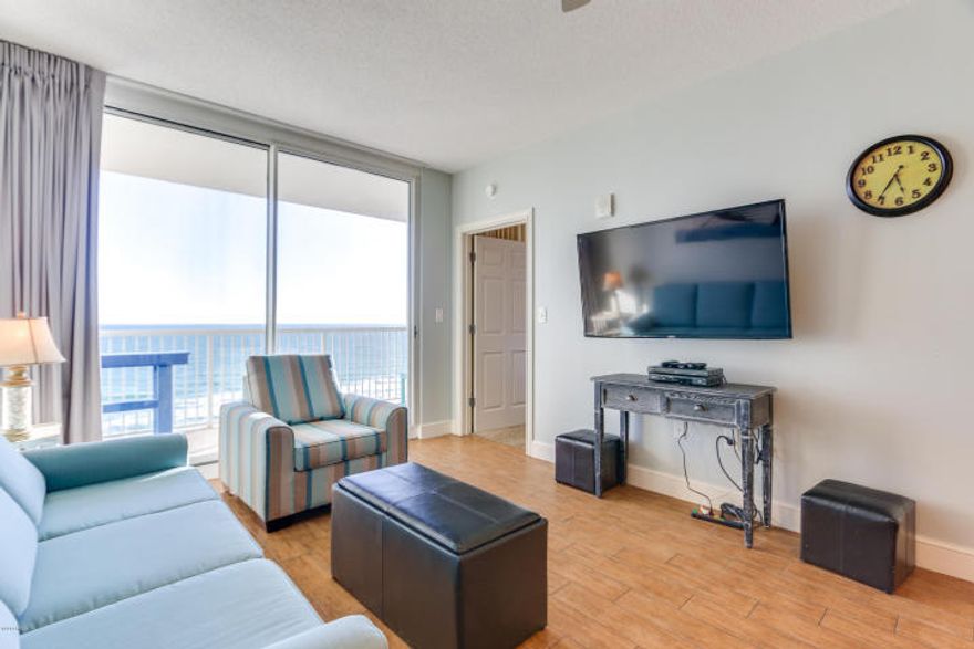 The pinnacle of Gulf front living, this 3 bedroom, 2 bath condo at Majestic Beach Towers offers a spacious floor plan with seaside inspired interiors. An unbelievable price for so much space! Upgraded plank tile floors in living area and customer tile work in the kitchen and master bath!! The 13th floor location allows for unsurpassed views of the Gulf of Mexico and the beach below. Pride of ownership shows in the well maintained property! Master bedroom and living/dining area are gulf front and open up to a generous gulf front balcony. On-suite master bath features a separate glass shower, whirlpool tub, doubly vanity and separate dressing area. A great weekend getaway or a wonderful investment opportunity. Enjoy the good life at Majestic Beach with an unparalleled deck of resort style