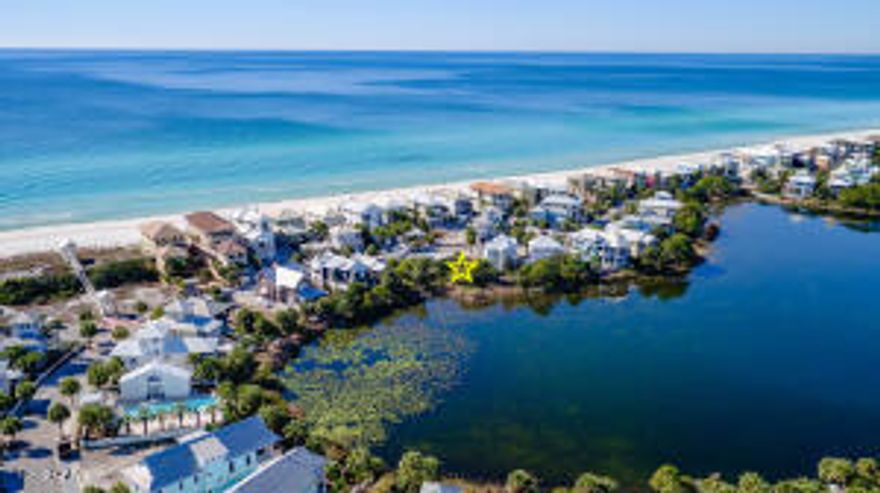 Truly once-in-a-lifetime opportunity to build your dream home in the heart of Carillon Beach.  Two adjacent lots on Lake Carillon with 120' ft. Beachside drive frontage and GULF-VIEWS from your new home.  This is the last opportunity to buy 2 contiguous lots on the lake and across from the gulf.  Building design is subject to Carillon Design Review Committee, but these two premier lots allow for the creation of a main home and guest home totaling about 5500-6000 sqft.   As close as you can get to the gulf, without being ON the gulf and paying premium prices for gulf-front lots and building on the gulf. Space for private pool, though community pool on the gulf is just steps up Beachside Drive.  NOTE:  Both lots are to be sold together.  Buyer to verify all dimensions/building restrictions.
