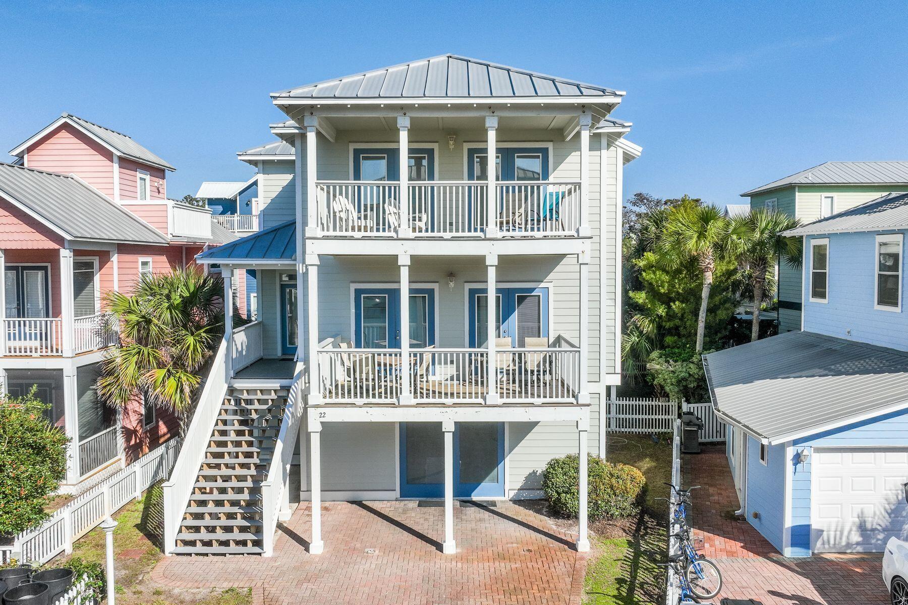 This quintessential beach house enjoys lovely breezes and views of the Gulf of Mexico sitting just three houses back from the beach. Nestled in the gated neighborhood of Sunrise Beach, on the south side of 30A, you have easy access to the beach with two beach walkovers maintained by the HOA. The home boasts a private pool and charming backyard for lounging after walking the beach. You'll find a huge gaming area on the first floor complete with air hockey & ping pong tables as well as bunks and a guest bedroom and bath. The built-in trundle bunks make into four beds. The main living area with fireplace and kitchen are on the second floor for best Gulf views from the balcony, and the guest bedroom on that floor also has a balcony and adjoining bathroom. The top floor showcases the