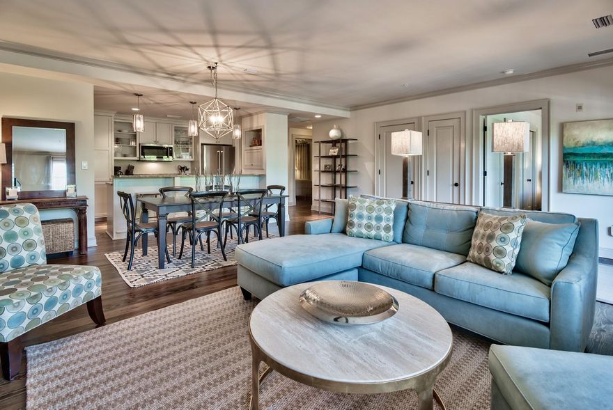 From the moment you walk into this beautifully decorated 3 bedroom, 2 bath condo in sought after Rosemary Beach, you will feel right at home. Discover an open floor plan with upgrades throughout, featuring pine hardwood flooring, gorgeous chef's kitchen with stainless steel appliances, granite counters, farm sink as well as bar seating. Relax in the spacious living and dining area with balcony access that overlooks North Barrett Square. A serene master retreat and ensuite bath with glass shower and soaking tub, as well as additional guest rooms, makes this an ideal sanctuary for family and friends as well as an excellent rental investment.