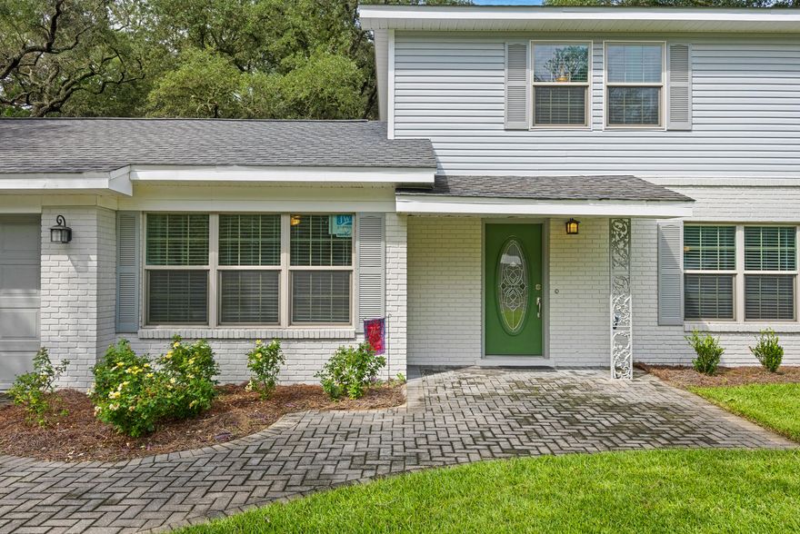 RARE OPPORTUNITY! This one you cant match for overall charm, utilization and value! The walk of mellow old bricks leads guest to the inviting entrance.The center entrance will provide access to the entire, updated home without undue traffic access through other rooms.Feel free to invite your friends & entertain in uncrowded comfort in this spacious dining room & updated kitchen designed with efficiency in mind. Fireplace, granite, wood floors & ceiling fans all accentuate the shaded views out the large windows. Updated bathrooms, new flooring, fresh paint throughout will have you feeling the elegance. The gentle breezes through the tree tops will be your lullaby in the oversized backyard filled with lazy afternoons & quiet serenity. This home is not a drive-by! Call today for showing