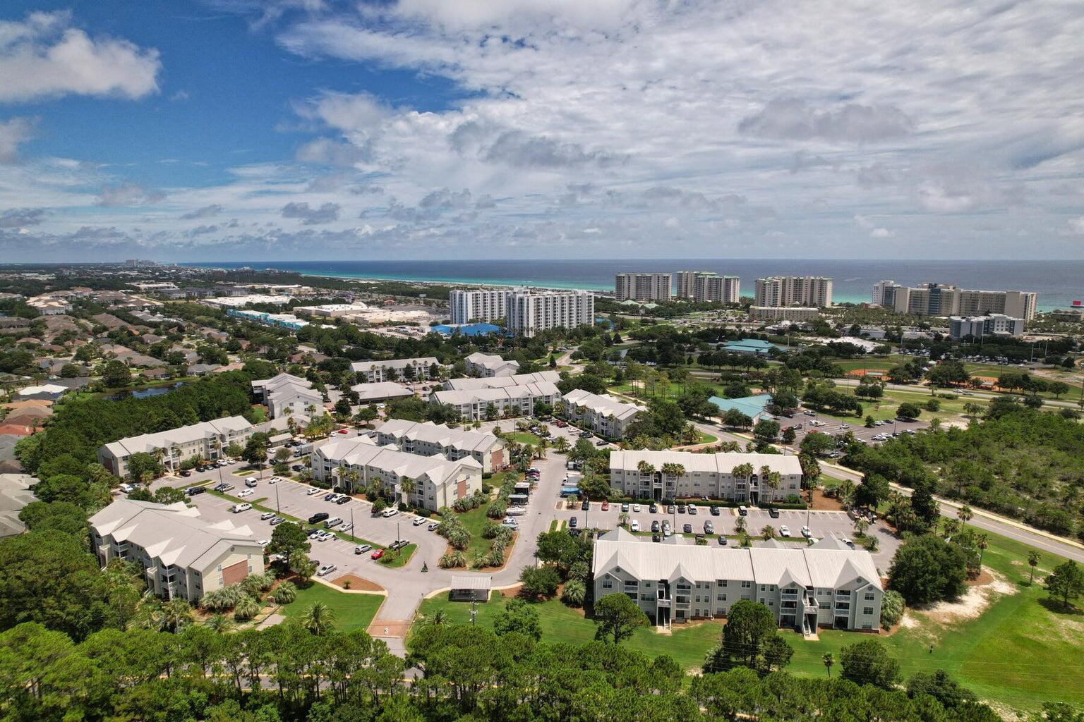 This freshly painted, second floor, all tile, large one bedroom unit at Indian Lake located in the heart of Destin!! The balcony not only overlooks the Destin City Hall and Destin Dog Park, but also includes a storage closet. Full size washer and dryer included. Minutes from schools, shopping, restaurants, and the beautiful emerald green waters & sugar white beaches. Indian Lake features, workout facility, clubhouse, and pool. Rent includes basic cable, trash, and pest control.Pets welcomes with restrictions