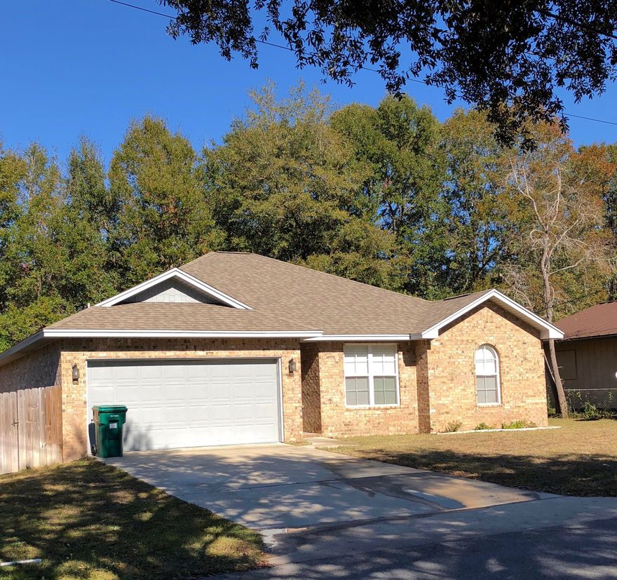 Great 2013 4Bed/2Bath brick home in the Heart of Niceville! Close to Ruckel Middle School, Niceville High School, parks & NWFSC. Spacious & open floor plan. Kitchen outfitted w/ stainless steel appliances, plenty of cabinet space & adjacent dining area. Kitchen & living area divided by granite breakfast bar w/ wood laminate and crown. Master bedroom is comfortably sized w/ en-suite and walk-in closet, while 3 sizable additional bedrooms along with full bathroom provide great additional living space. Utility room with washer/dryer hook-up and garage conveniently located directly off kitchen. Door off dining area leads out to privacy fenced yard. Great location & NO HOA. Close to Eglin AFB, Duke Field, and those famous white-sandy beaches of Destin! Schedule a showing today, a must see!