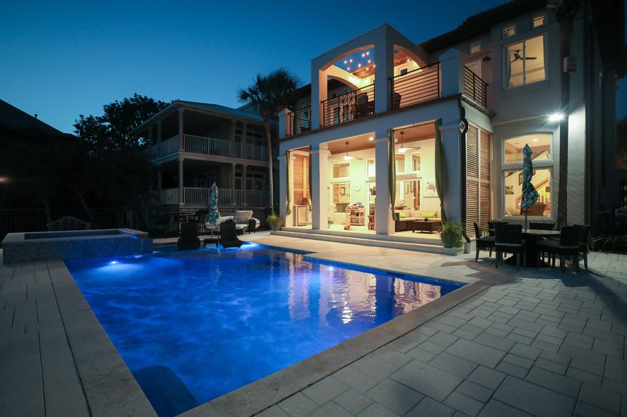 Will take back-up offers. Truly a remarkable home less than 750 ft. from the beach and just over 3700 sq. ft. The home was planned with luxury, design, and innovation. Complete remodel from 2015-2016.  From the moment you walk through the gated entry into the serene courtyard with 10x5 Bobe water/fire feature, this luxurious home greets you with comfort and style. A one of a kind residence in Destiny. One of the most sought-after neighborhoods on the Emerald Coast. The custom interior upgrades and finishes accentuate this home's desirability and functionality. Perfect for a wedding venue for one hundred to a family of five. Stone floors lead the way into the great room with open living, dining and kitchen.