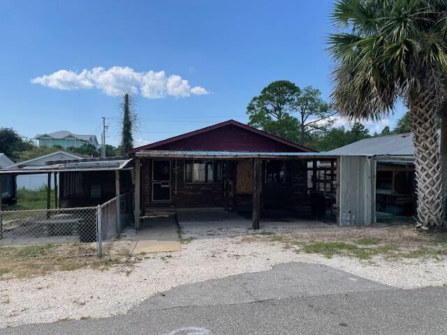 Great location off 30-A in the Brickyard. 3 BR and one and one half bath. Home is in need of a whole house renovation. House sits on two lots. close to beach and restaurants.