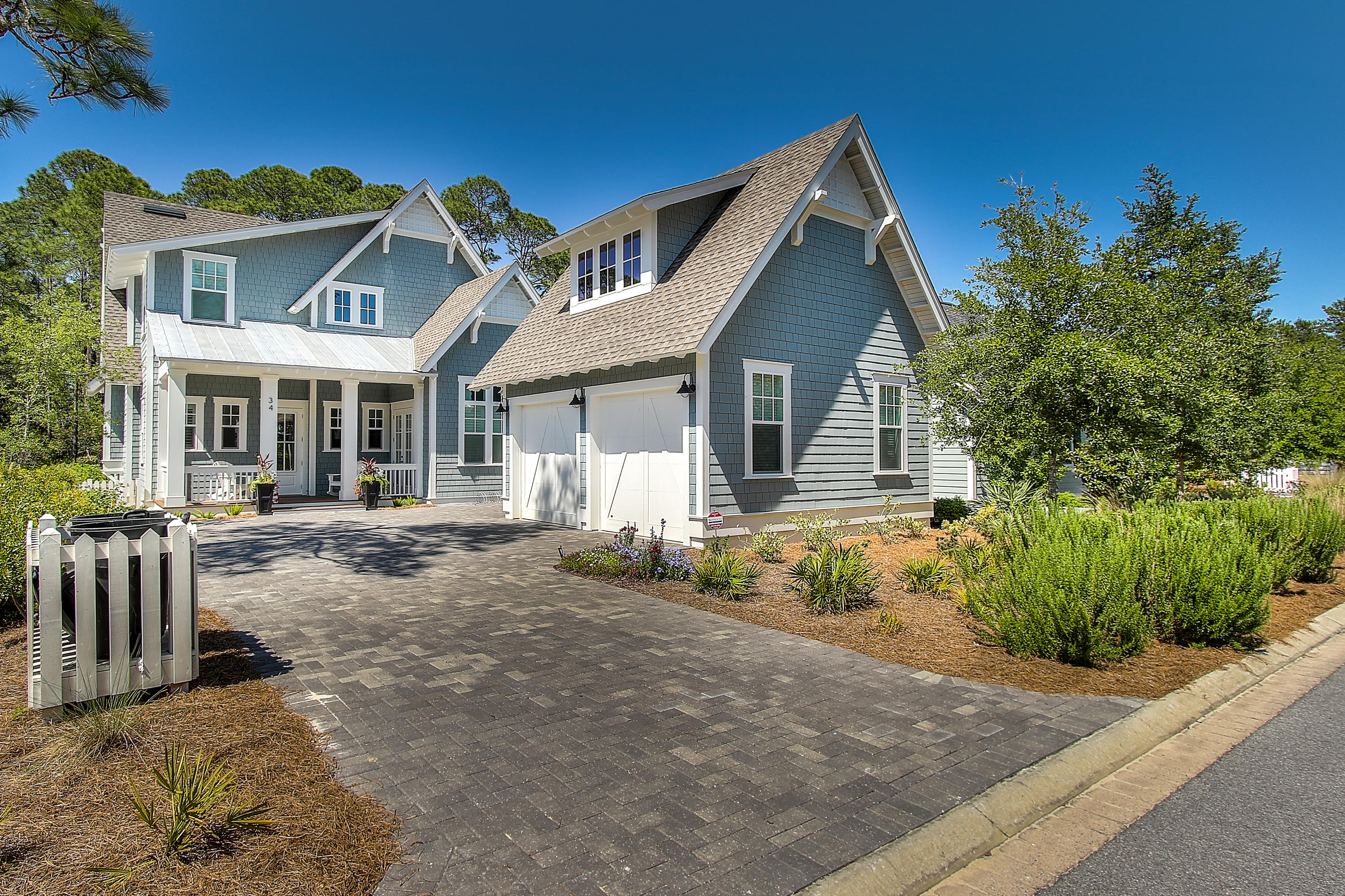 This charming coastal retreat in beautiful WaterSound West Beach is a must see. This spacious open concept floorplan offers relaxed and elegant entertaining with a gourmet kitchen, gas fireplace and an abundance of windows. The great room opens onto large screened in porch overlooking PRESERVE AREA offering privacy not found in many WaterSound West Beach homes! This 4 Bedroom, 4.5 Bath home with 2 car garage has recently been repainted and would make a great primary or rental/investment property. The details for this beach home are a must see. Some features includes an open floor plan with a gourmet kitchen with granite and Carrera marble honed/ sealed countertops, updated cabinets, a fireplace, hardwood flooring, built-in custom bunk beds, newly painted interiors,