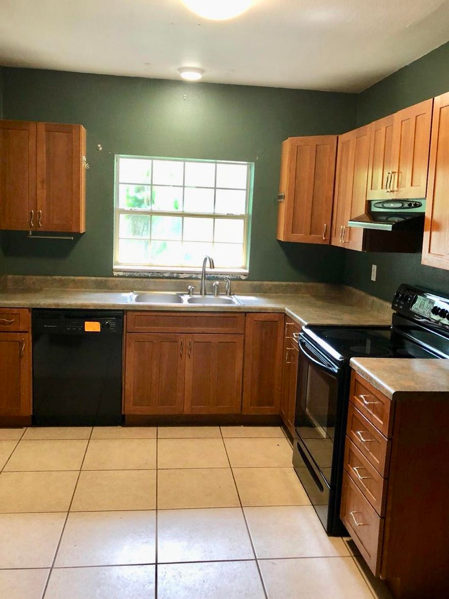 Great home with 1,636 square feet in the heart of Niceville! Green house and workshop sold as is. They started to build out the attic over the garage (would not take much to finish it). This home is near everything, including Eglin AFB, schools, and shopping. Lions Park is a short walk away as well, which is a lovely two-acre park on Boggy Bayou with two boat ramps, pavilions, tables, and benches.