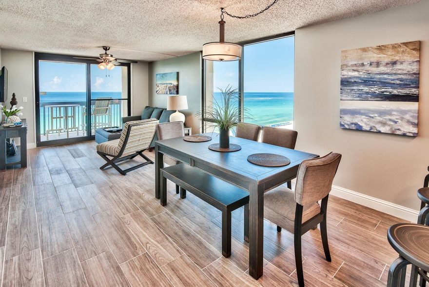 Looking for an upscale contemporary Gulf front unit in one of Destin's original condominiums? Unit 1012 at SunDestin Resort is truly breathtaking and has luxury finishes throughout the unit. This is one of the nicest units at SunDestin with brand new renovations. This 2-bedroom, 2-bath unit is a west corner unit with wrap around floor to ceiling glass windows & doors that truly maximize the Gulf views. Interior features include brand new beautiful porcelain tile flooring throughout, custom lighting, upscale furniture and decor, flat screen TVs, granite countertops, unique backsplash in the kitchen, crisp white cabinets with contemporary pulls and new stainless steel appliances. Capture views of the emerald green waters from the kitchen, dining & living area and Gulf front master bedroom.