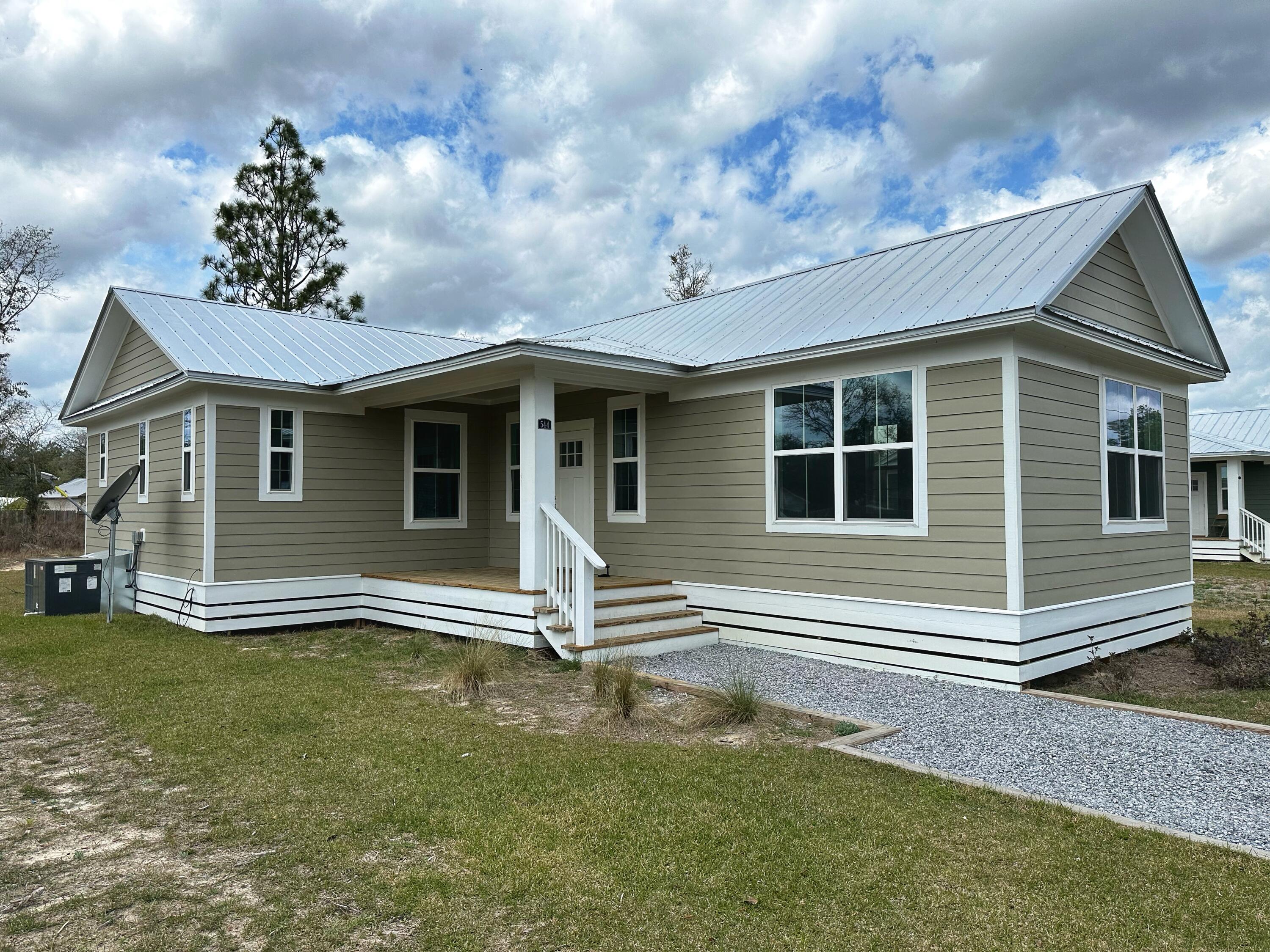 Ready For A New Tenant! 3 bedroom 2 bathroom piling home. This build features vinyl plank flooring throughout the entire home with an open-floor layout. In the kitchen, there are stainless steel appliances, shaker style cabinets & quartz countertops. The master bathroom has a stunning tiled shower and walk-in closet. Call today for a showing!