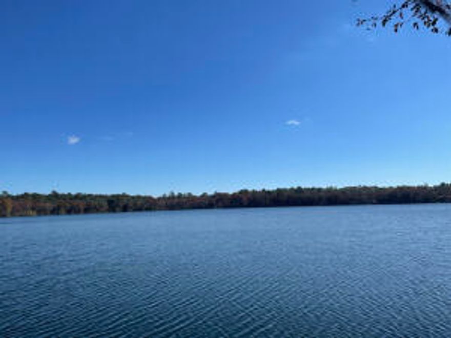 Two adjoining waterfront lots on Blue Pond one of NW Florida's natural spring fed lakes. Seller has topo survey for the property.  Site work has been done. Must see to believe.  Swim, snorkel, scuba dive or fish.  Blue Pond is famous for its dinner plate size bream and largemouth bass.  Asphalt driveway down to the level base of the lot has been clearly marked with orange survey tape.   Please note: Seller also owns the two adjoining lots, and they are for sale too. Seller firm on list price