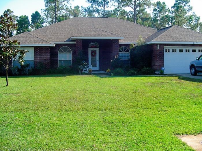 This 4 bed/3 full bath home features all the extras you are looking for. Step into the foyer and find your formal dining room on your right and a bonus room on your left,which can be used for a formal living room or your own private office. Family room has a large corner fireplace, ceiling fan, plant ledges and is spacious which gives you ample room to place all of your furniture. The eat-in kitchen is a cooks dream with those special up grades. Extensive all wood cabinets, granite counter tops, pantry, double stainless steal sink with tile floors and all your appliances.The most impressive future in this kitchen is the large island in the middle of the room which houses your glass cook top, The separate oven is located behind the island, where is has been raised for your convenience,