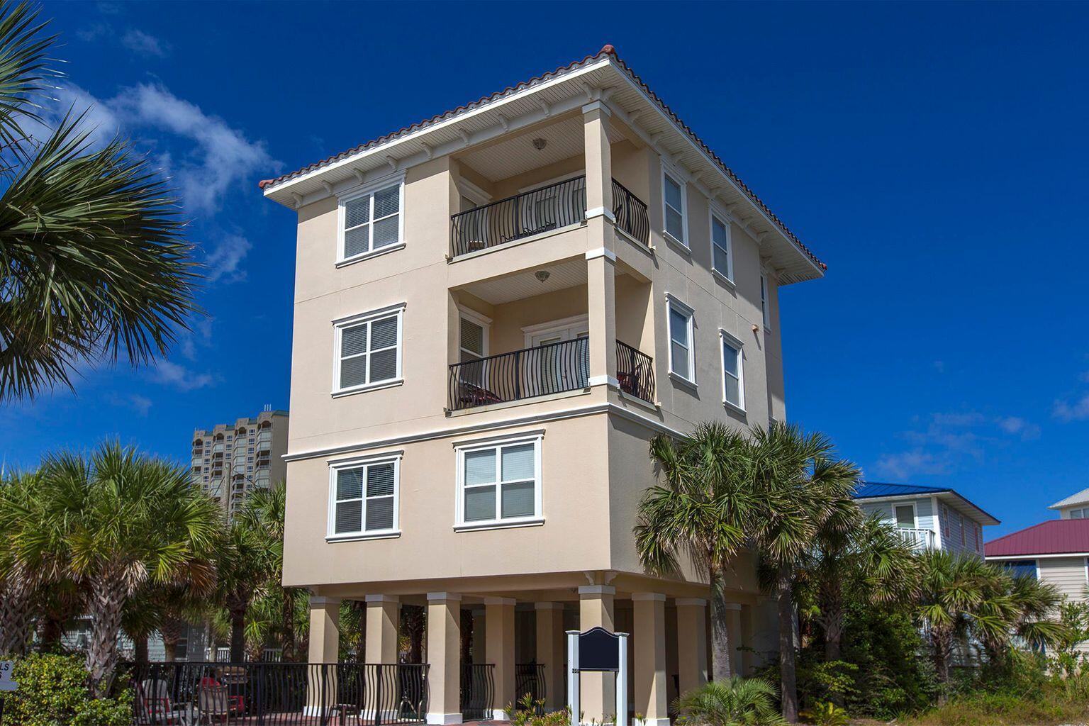 Under Contract ACCEPTING BACKUP OFFERS!   Enjoy the majestic sunrise and sunsets from covered balconies and located only one house to the beautiful emerald waters and white sands.  Great Miramar beach location this home features 5 bedrooms (two masters), 4 1/2 baths, (four full baths), this floorplan offers almost 3,000 square feet of custom luxury.  Freshly painted interior and loads of windows for natural lighting, the spacious living room with dining and open kitchen concept featuring granite countertops.  Other highlights include diagonal tile throughout for easy maintenance, 10 foot ceilings with crown molding, stainless steel appliances, custom cabinets and recent designer furnishings.  Enjoy your own private pool with wet bar area after a day on the beach.