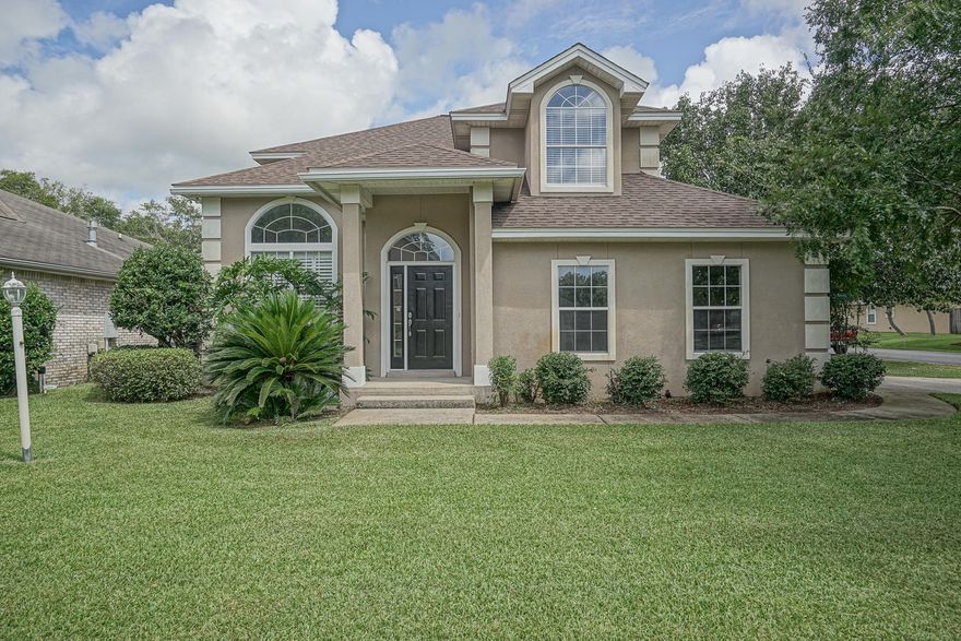 Very conveniently located to Eglin Air Force Base and Hurlburt Field this home is ready for immediate occupancy.  Large living area features a pretty fireplace with arched opening to formal dining room.  Kitchen offers good cabinet and counter space with an eat-in area.  Covered patio off kitchen is great for easy grilling.  Inside laundry room with sink and shelving for extra storage.  Master bedroom has trey ceiling and adjoining bath with dual vanities, separate shower, garden tub and walk-in closet.  Guest bedroom has cathedral ceiling and alcove that would be great for a desk or vanity area. Enjoy nice size backyard from the 10 x 13 covered patio. North Ridge Creek has a preserve area with gazebo and walkway that's great for getting back to nature. Call today for your private viewing.