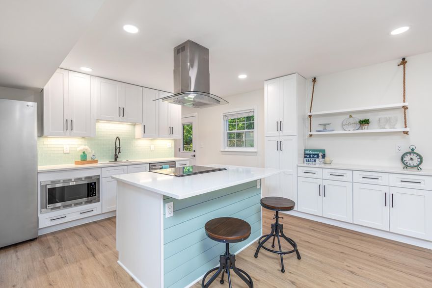 This gorgeous, completely remodeled home boasts elegant finishes, fresh white paint, warm hues and ample space. The large kitchen will be a favorite space for your family to gather and entertain. Upstairs you'll find the master bedroom is a spacious 16x13 with a walk in closet, subway tile shower with a glass door, quartz topped vanity and new finishes. The other two bedrooms are also generous sized with great closet space. Remodel also includes new roof, grounded copper wiring, insulation in attic, lvp floors, carpet, and lighting. Newer HVAC and tankless hot water heater. Oversized garage and shed (with electric) provide great storage! Convenient to Eglin and Hurlburt and walking distance to Silver Sands Elem and Bruner Middle.