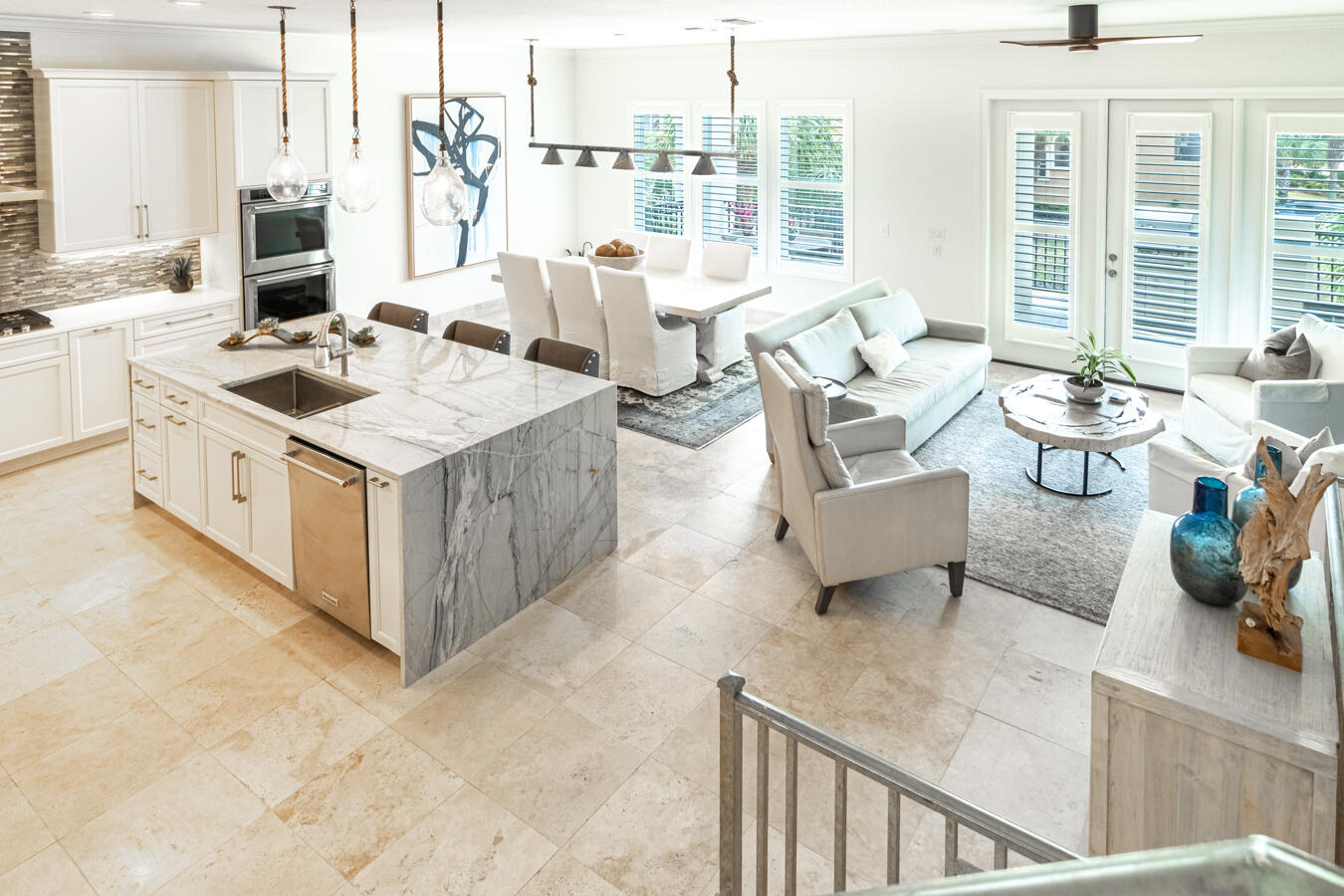 High style and low sunsets highlight Ocean Boulevard with a stunning Destiny by the Sea renovation. Bright, airy, and luxurious, this one-of-a-kind home has been positioned and designed to capture the blue-green gulf views of Crystal Beach, and is projected to top $100k in first year rental income. Enjoy elegant finishes, fixtures, and furnishings, including tastefully-selected artwork and custom window coverings. Exterior balconies on all three floors are deep, spacious, and provide outdoor living spaces that rival interior comforts. Subtle color accents compliment a neutral palette, while clean lines seamlessly blend transitional, modern, and industrial design. No surface is untouched by the owner's careful eye for decorative detail in this spare-no-expense renovated beach retreat.