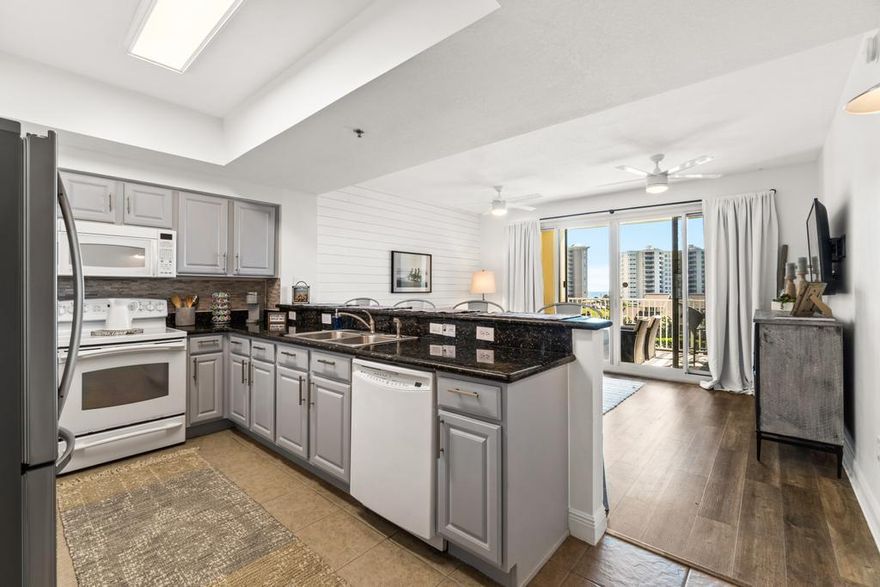 THIS IS THE DEAL THAT YOU HAVE BEEN WAITING FOR! Enjoy waking up near the Gulf from this recently updated unit located in Ariel Dunes II, which is tucked behind the private gates of Seascape Resort! This tastefully decorated condo is freshly painted and features an exterior storage unit, new high end furnishings, new HVAC, new fridge, new shiplap, new lighting fixtures, and freshly painted cabinets with new hardware. WELL-MAINTAINED & RENTAL READY, this condo makes the perfect second home or vacation rental property with a rental projection in excess of $45K+, or a fantastic low-maintenance primary residence. You and your guests are sure to enjoy easy to clean laminate floors in the living room & bedroom and tile throughout, granite countertops in the spacious kitchen, and the generously