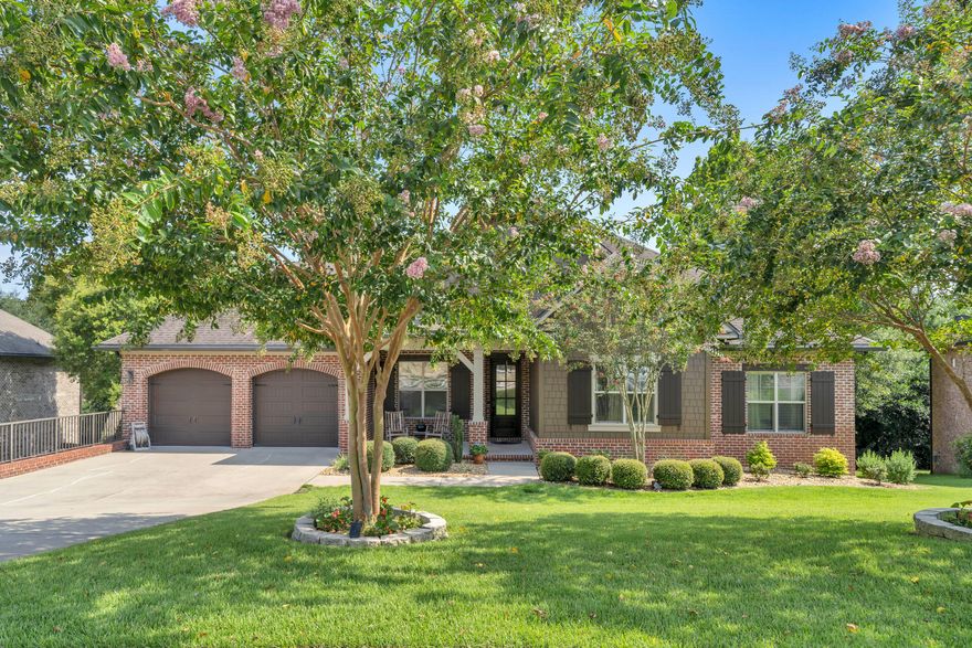 BETTER THAN NEW home in Swift Creek Plantation built by award winning Randy Wise Homes, renowned for both the quality and design of their Treetop Series ''walk-out basement'' homes! The gorgeous brick home is located on a .33-acre lot adjacent to a nature preserve providing the utmost privacy and beautiful tree studded views from both the upper deck off of the main living area and the covered patio off of the walk-out basement. This 2-level home has lots of room for multi-generational living with the main living areas along with the master bedroom and 2 additional bedrooms on the 1st level and an amazing rec room, family room, kitchenette, another bedroom suite and a multi-purpose room that could be used as a media room or gym in the walk-out basement featuring a ''safe room''! A friendly