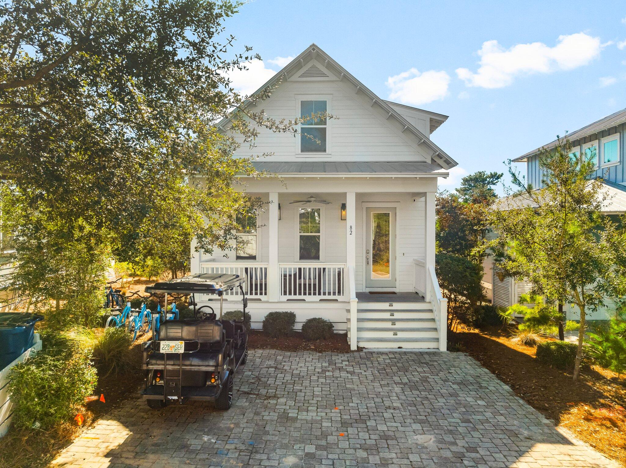 Welcome to your dream beach cottage at 82 Gulfview Way, Santa Rosa Beach, FL. This modern, fully furnished gem offers a seamless blend of comfort and style, perfect for those seeking a serene coastal lifestyle. Spanning 1,735 square feet, this charming home features three spacious bedrooms and two and a half bathrooms, including a convenient primary bedroom on the first floor.Step inside to discover an open living space adorned with elegant wood floors throughout, creating a warm and inviting atmosphere. The heart of the home is the airy living area, ideal for entertaining or relaxing after a day at the beach. The upstairs hosts a unique Jack and Jill bathroom, providing privacy and functionality for family or guests. Enjoy the Florida sunshine on the expansive front porch, a perfect spot for morning coffee or evening gatherings. The generous 5,227-square-foot lot offers ample space for outdoor activities and the potential to add a pool, enhancing your private outdoor oasis.

This cottage is located in the highly sought after neighborhood of Highland Parks.   We a huge resort style pool which is heated year round as well as an outdoor kitchen, firepit, hot tub and 4 story tower to see sunset.   With its turn-key status, this home is ready for you to enjoy as a primary home, second home, and/or investment property.   Golf cart is included. Don't miss this opportunity to own a piece of paradise!