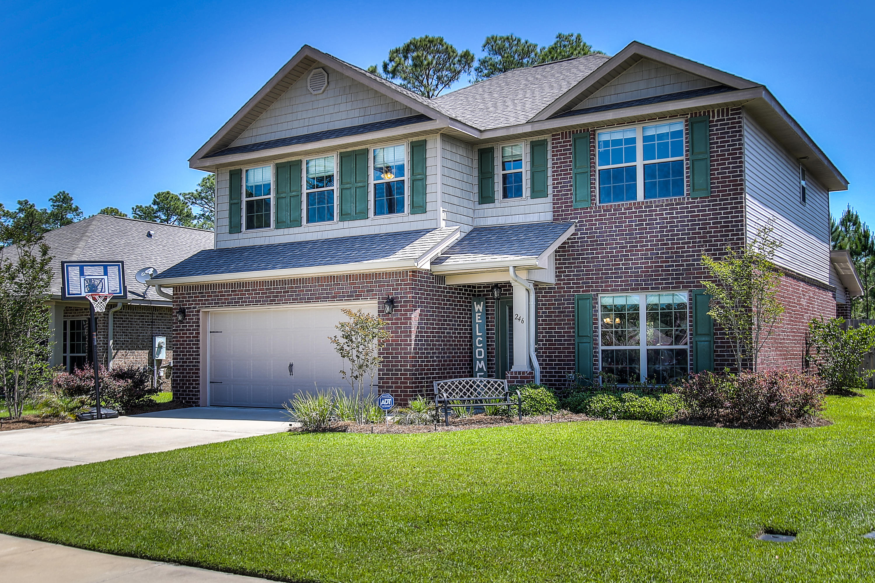 This beautifully landscaped, 2-story home is conveniently located in Driftwood Estates; featuring beautiful hardwood floors upon entry, the open floor plan allows for a spacious living area and open kitchen. The breakfast bar is located off the kitchen and overlooks the living area making this home great for entertaining. The kitchen features stunning stainless steel appliances with upgraded GE stove with bridge burner and warming drawer, granite countertops, hardwood floors, plenty of cabinet space and large pantry. Just off the kitchen is a great dining area that includes backyard access. The first floor also features a simple, yet elegant half bath for guests and large master bedroom. The master bedroom features hardwood floors and crown molding throughout.