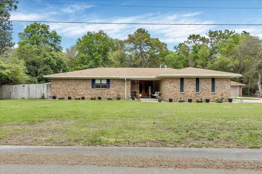 Look no more this is what you've been waiting for! Custom built home on a private half-acre lot that backs up to the Eglin reservation and is only five minutes from Eglin's West Gate. 2200 square feet of living space with an additional 1000 square feet of garage space (2 car garage attached to the home and a separate 2 car detached garage). I love this floorplan! This 3 bedroom, 3 bath design includes two living areas separated by a central kitchen - all with direct access to the enclosed saltwater pool to enjoy your morning coffee or grab a cocktail. New roof installed 7/2021 and recently upgraded inside and out to include bathrooms, flooring, new gas line and Gas range, upgraded interior lighting, new pool pump, new irrigation pump and sprinkler heads. All that's missing is you!