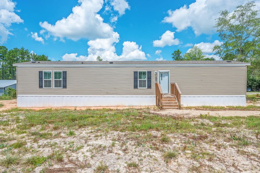 New 2025 manufactured home featuring 3 bedrooms and 2 bathrooms on a .25-acre lot. This modern home offers an open floor plan with a bright living area, well-equipped kitchen, and split bedroom layout for privacy. The primary suite includes a private bath, while two additional bedrooms share a full hall bath. Enjoy low-maintenance living in a peaceful neighborhood, conveniently located near schools, shopping, and dining.Rental requirements include a minimum credit score of 600 for all adult occupants, at least one year of consistent employment, and a monthly household income of at least 2.5 times the rent amount. Application required including credit report & background screening. Apply on Zillow or Rentcafe NO PETS