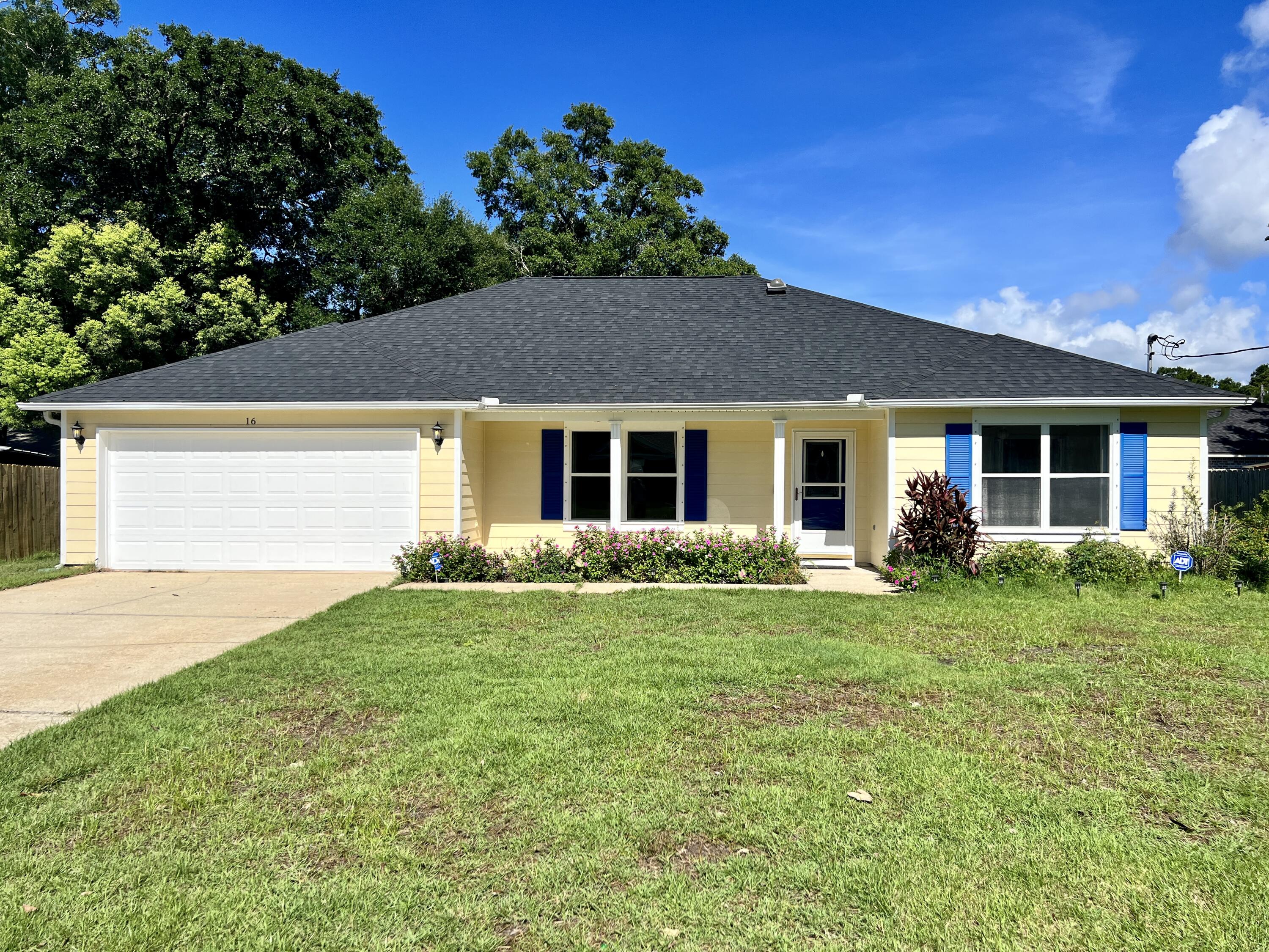 New Roof, HVAC & Carpet in Bedrooms! This beautiful home showcases several amenities & updates throughout including a new roof, new HVAC, & new elements/draining system for hot water heater.  The exterior includes a spacious backyard, open deck with retractable awning, sprinkler system, yard building, & privacy fence. The interior features a large living room with a tray ceiling & recessed lights, tile flooring throughout living spaces, & eat-in kitchen featuring a kitchen island, pantry & stainless-steel appliances. The owner's suite is separate from the other bedrooms & includes a walk-in closet, double vanity, & closet space in the owner's bathroom. The property is within walking distance of a public water access point & within a short drive of Downtown Ft Walton Beach & beach access.