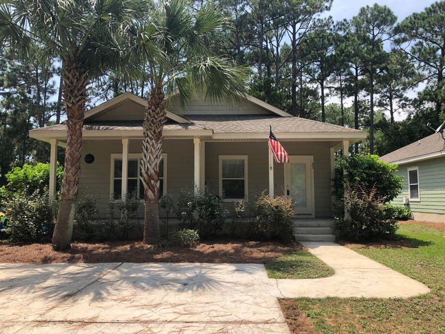 Beautiful Florida Cottage. Stone countertops in the kitchen, maple cabinets with crown, stainless steel appliances, cultured marble bathtubs & vanity tops, double vanity in master bath, walk in closet in master, 9 foot ceilings throughout, 20x20 tile everywhere except the bedrooms, porches on the front & rear of house and many other great features.