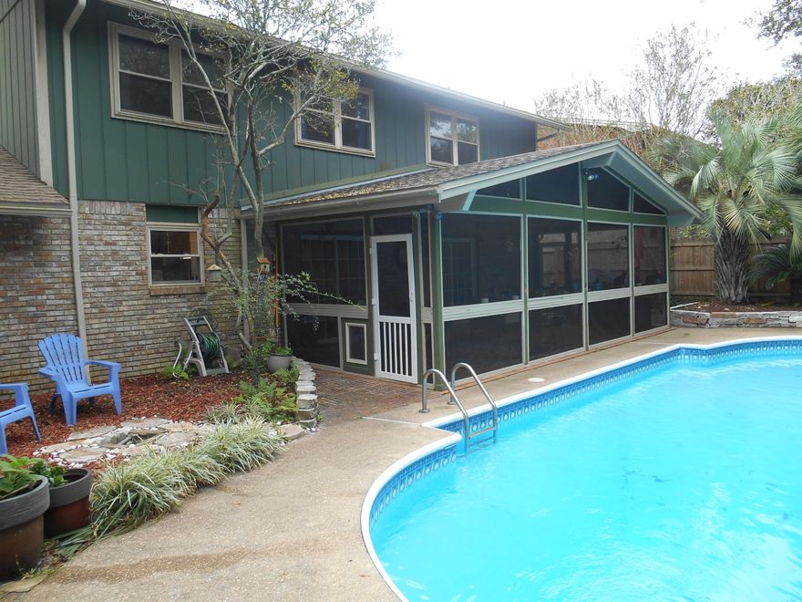 5 Bedroom 2.5 Bath Pool home in the  highly desirable Kenwood subdivision.  Master Bedroom is downstairs with a sliding glass door out to the best feature of the home, the large vaulted screened porch overlooking the beautiful pool deck and back yard area. Enjoy the outdoors year round with shade & protection from bugs.
Fully rewired with copper wiring in 2018. New HVAC in 2018. New water heater in 2016. All new Frigidaire Stainless Steel appliances in 2017, granite counter tops. New driveway in 2012 & new wood privacy fence in 2017. Upgraded blown in insulation in the attic.