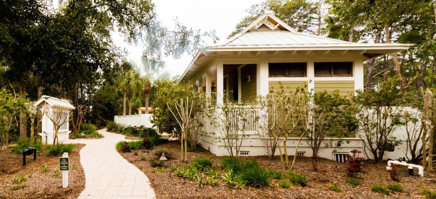 This is a ''Green'' development and this lot backs up to the State Park! If you like nature, trails and privacy, this community has it all. Brick paver streets and a dedicated green space. Wonderful sidewalks which are a rare find on 30A. There is a large community pool and gathering area complete with a arbor, rest rooms, gas grill and outdoor furniture for relaxing. Natural gas is available in Greenway Park and there is no build out time. Located in the heart of 30A and only a short stroll to the beach and Gulf. Only minutes to the rare coastal dune lake - Eastern Lake.