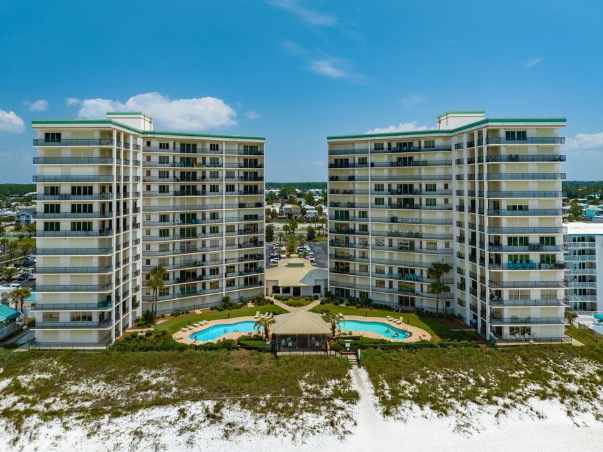 Introducing an exquisite two-bedroom gulf front condo at Summerwinds condominium. This updated unit offers a luxurious coastal retreat, combining modern elegance with breathtaking views of the pristine white sand beaches and sparkling turquoise waters of the Gulf of Mexico. As you step into this meticulously maintained condo, you are greeted by an open and airy living space filled with natural light. The tastefully appointed living room features plush seating, allowing you to relax and unwind while enjoying the stunning gulf views. Sit in your living room chair and see where the water and sand meet. The gentle sound of waves crashing against the shore creates a soothing ambiance, providing the perfect backdrop for your seaside getaway.