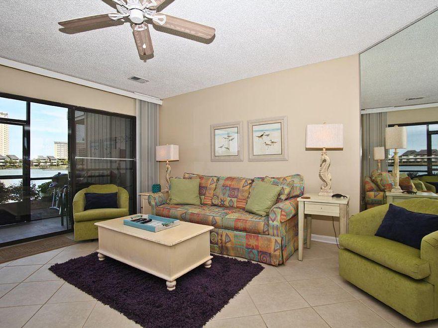 Awesome location in Seascape, a gated community. Just steps to the beach, boardwalk and Whale's Tail Beach Bar and Grill. Close enough not needing a car, yet the location offer serenity and no traffic. A must see!! One of the five pools is just across the street. Great views of the Steward Lake from 1st floor patio and second floor balcony. This is a two story unit with entrance from the ground floor level so very easy access. Being an end unit it offers extra windows for plenty of sunshine and views. Newly remodeled kitchen and bathrooms. A must see. Great investment property. Projected gross income 2017 $25K-$30K. Has $16K for future reservations booked.