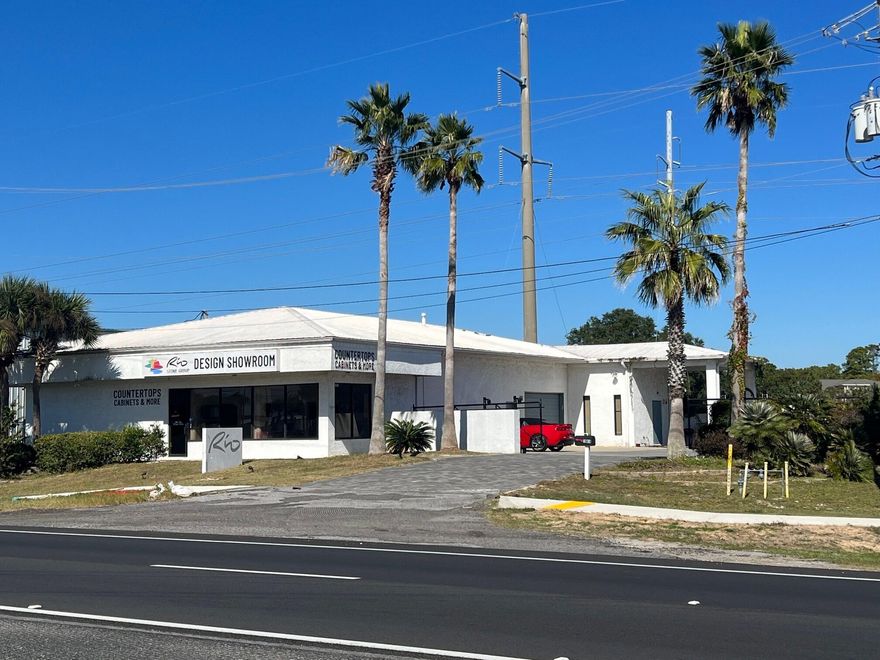 On the West End of Panama City Beach, great frontage, easy access to Pier Park and 30A.  Next door to Back Beach BBQ.  Fully Remodeled Showroom in front, Small Warehouse and potential live in apartment in rear.  Small fully fenced yard.  Great Opportunity for new business or investment.