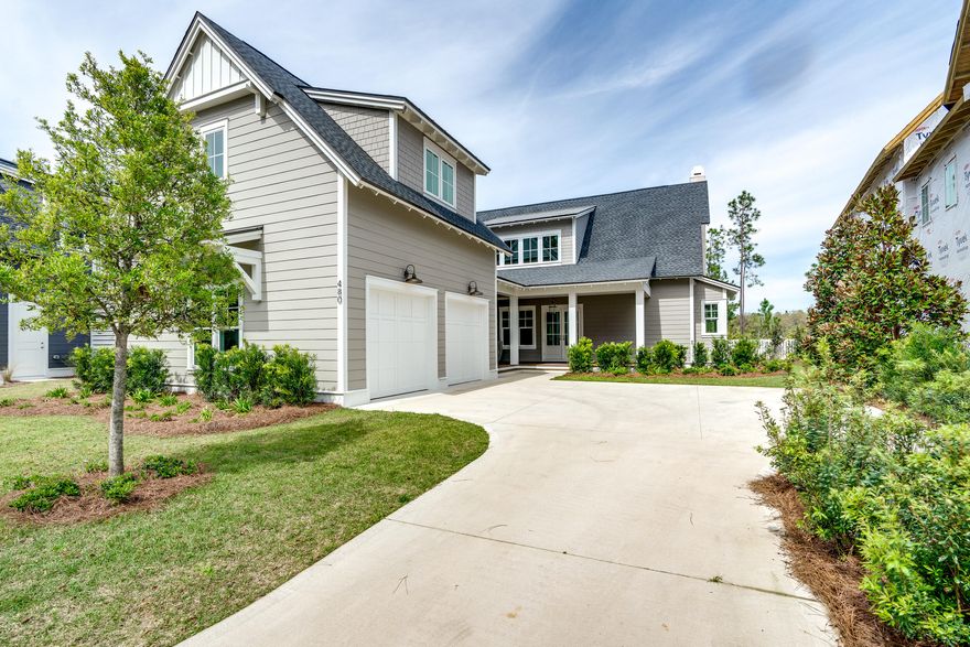This custom Weatherly plan built by Romair Homes is situated on a premium home site overlooking the Origins Golf Course with a spectacular outdoor living space. This home design offers 5 bedrooms including a first floor primary suite and Carriage House, 5.5 bathrooms, 2-car garage, private pool + spa with Baja deck, 2 fireplaces, an outdoor summer kitchen and loads of upgrades! Luxury interior features include Jeld-Wen slider doors leading to a 12' wide porch overlooking the golf course, large carriage house (600 SF) with kitchenette and storage closets, custom cabinetry, Wolf & Sub-Zero appliances with 36' Wolf range and Scottsman Ice Machine, wet bar, steam shower in primary bath, marble and porcelain tile baths, engineered hardwood floors throughout, and