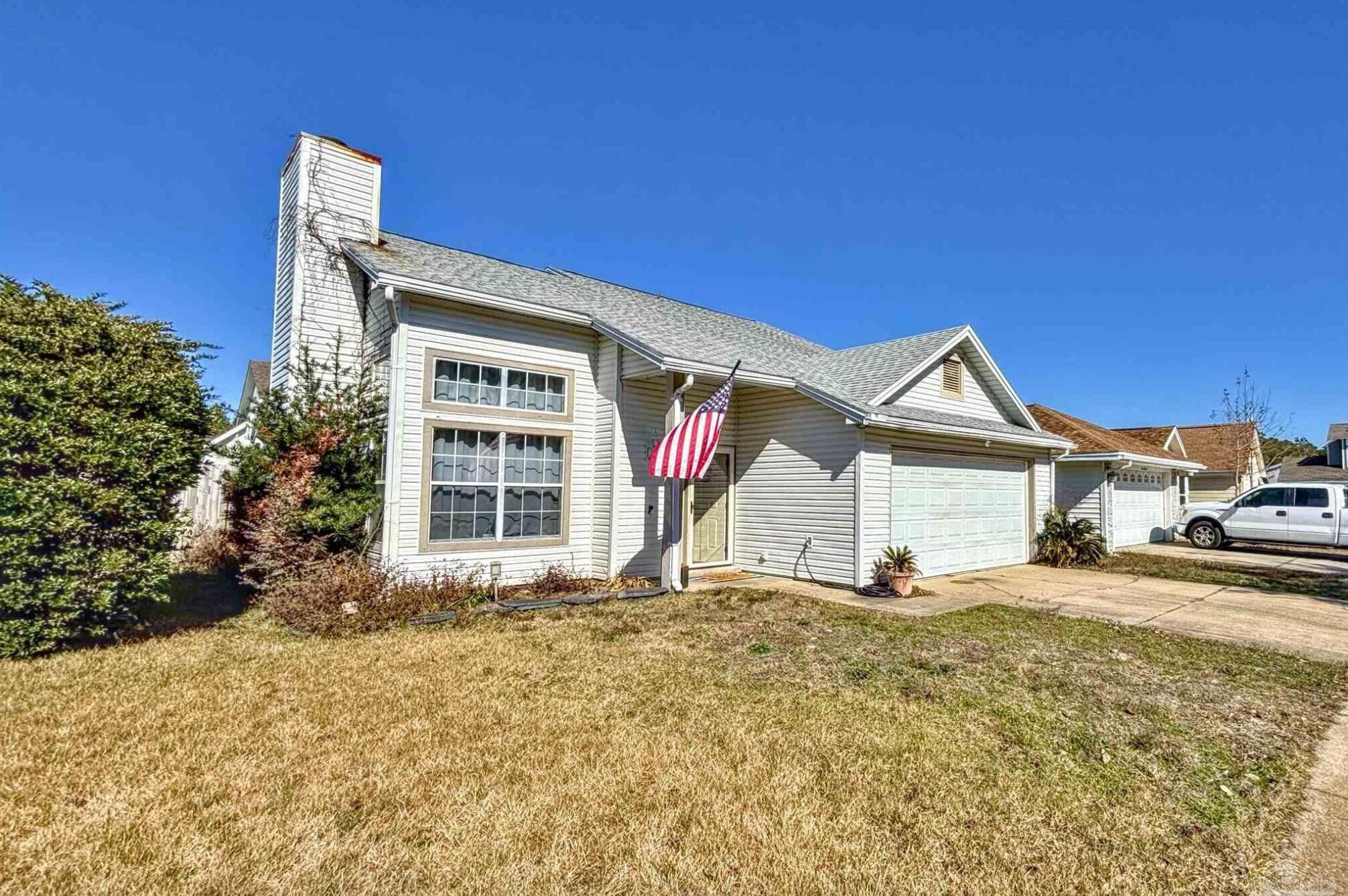 LOCATION! LOCATION! 2021 ROOF and 2022 HVAC, water heater 2020, New kitchen appliances 2024!! New flooring throughout 2021. Minutes to Hurlburt AFB! Spacious home! As soon as you come in you will notice the beautiful wood laminate floors, vaulted ceilings, and cozy wood-burning fireplace. The open living and dining space is perfect for any family. gatherings. The kitchen features lots of natural light, a breakfast bar, and stainless-steel appliances. The primary bedroom and bath are downstairs, and an additional two bedrooms and full bath upstairs. The French doors off the dining lead to the screened-in patio and fenced-in backyard with lawn pump and sprinkler system.