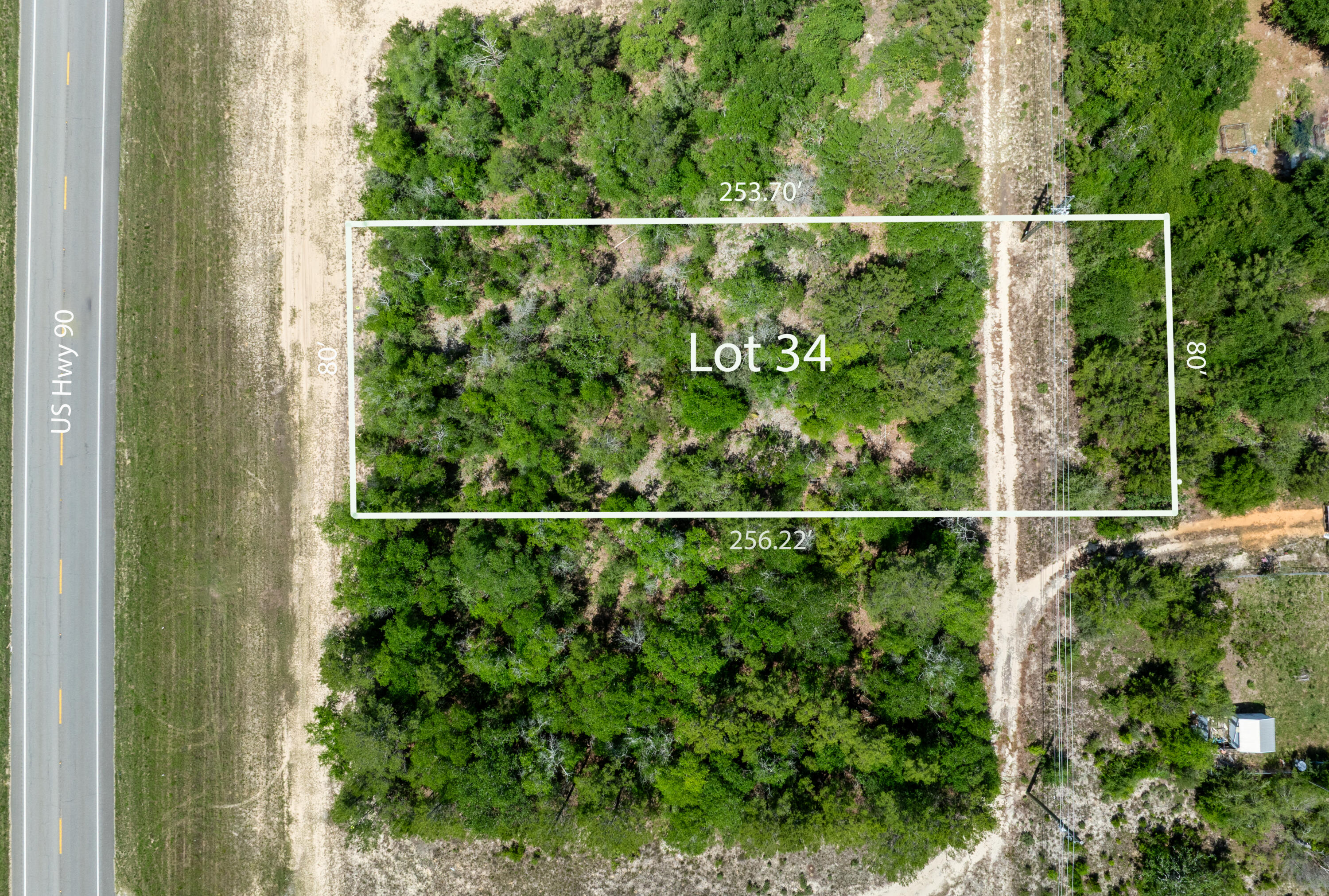 Located directly on US Hwy 90 between DeFuniak Springs and Crestview close to Mossy, this beautifully wood lot approx .46 acres. Mobile homes allowed. No HOA. Minimal Restrictions. There are no existing utilities. Well/Power/Septic required. Power is at the roadside. Zoining Rural Low DensityThe property is Flood Zone X. Per the Walton GIS mapping, the property does not appear to have wetlands. Easy access to the I-10 & CR 285 south making it a great location for work no matter what direction you need to go! You will be approx. 30-45 mins to most workplaces as well as the beautiful white sandy beaches of Florida famous Emerald Gulf Coast and Crab Island. Information contained within this listing is deemed to be accurate but is not guaranteed. All dimensions shown are approximate.