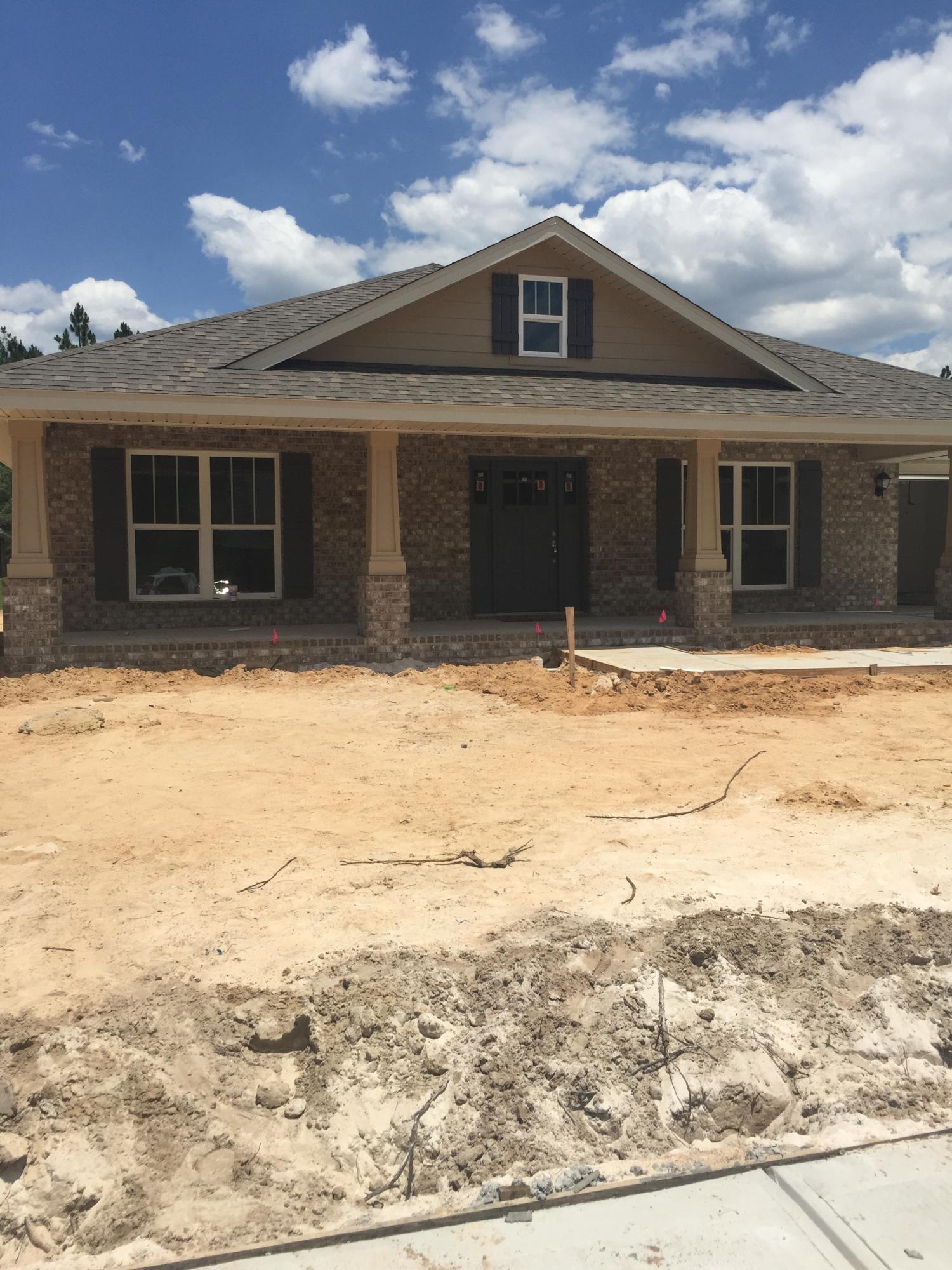 All brick Five Bedroom/three bath home on the lake in Symphony at Hammock Bay! Plenty of space for a growing family. This home has two large covered porches to enjoy the outdoors! Interior features include granite counters, hardwood floors, porcelain tile, Moen fixtures and more. 1, 2 and 10 year warranties and closing costs paid with approved lender. (Except prepaids) CDD fee applies.