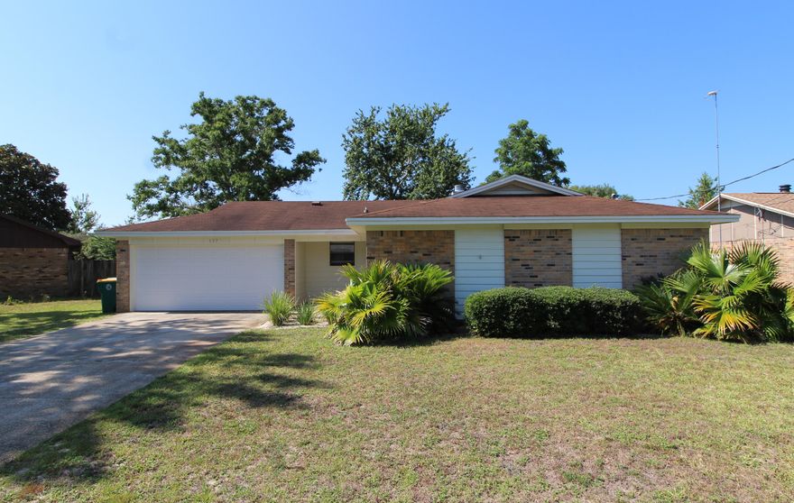 MOVE-IN READY! Welcome home to this beautifully maintained all brick home situated in a quiet neighborhood. Spacious and open living area that offers a fireplace with hearth and French doors that lead out to a open patio with flagstone pavers perfect for grilling out this summer. Dining area opens into the living area great for entertaining. You won't miss anything in this open concept kitchen with custom cabinets to include a side pantry, granite counter space, stainless/black appliances, large center island with lots of storage and a breakfast bar. Master bedroom has a private bath with oversize tub/shower combo and tile surround. Updated hall bath with extended vanity and tile. Two good size additional bedrooms on has double doors that could easily be used as an office/den