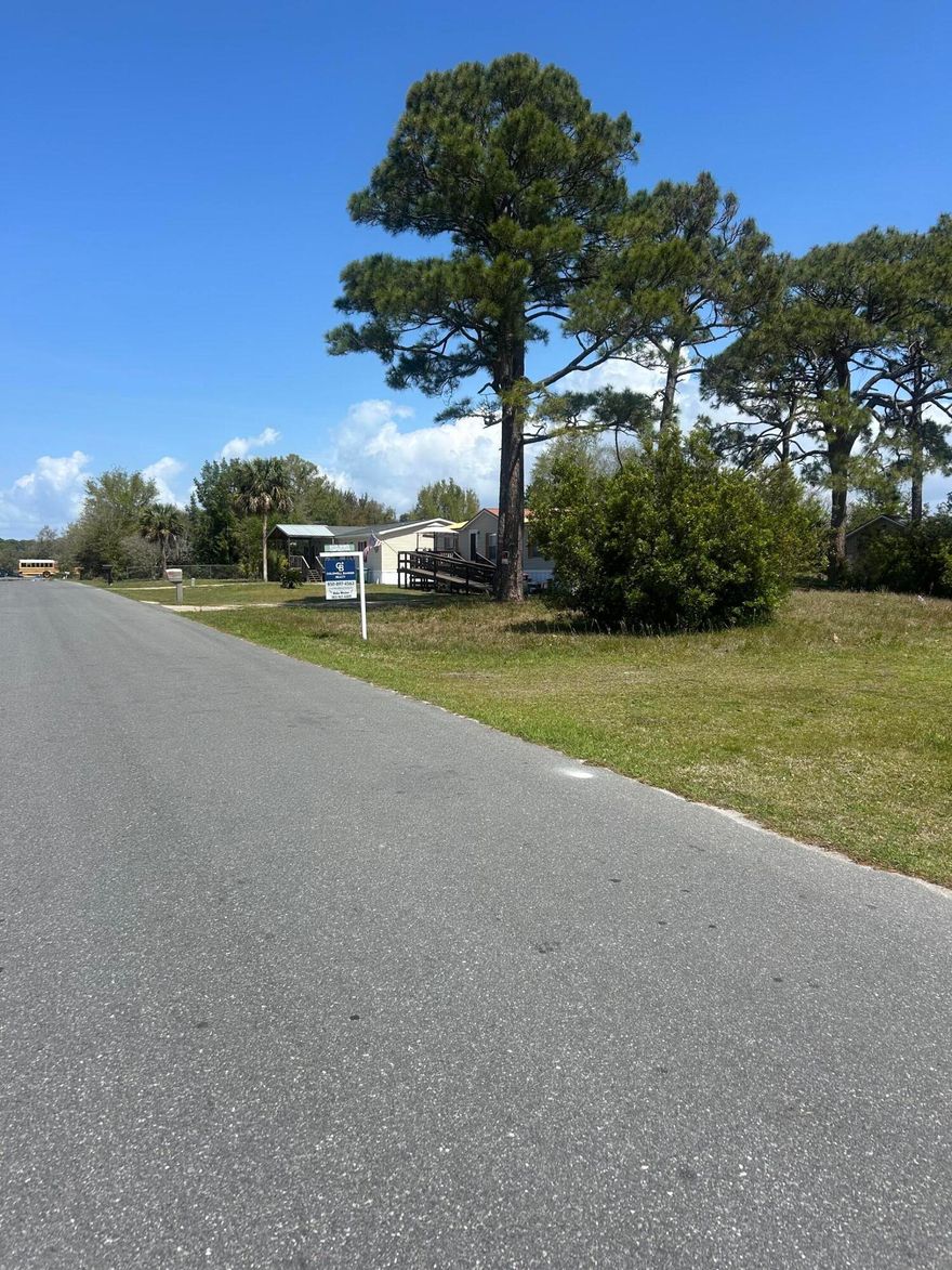 Prime vacant lot located in the desirable North Lagoon Oaks subdivision, less than a mile from the beach. This versatile property is zoned for single-family or duplex, making it perfect for building your dream home, a vacation getaway, or an income-producing rental.Existing survey.