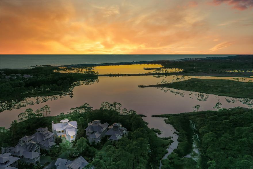 Step through the front doors of this private WaterColor retreat and you'll know you're home. Nestled on a quiet cul-de-sac backing up to forever green space and glittering views of Western Lake beyond, this 2018 build by Chris Clark is ideal for a buyer looking for all the amenities and activities available in WaterColor with a quiet reprieve from the hustle and bustle of a resort community.Featuring six bedrooms, two bunk-rooms and a full home gym, this Vermilion Way home boasts the absolute best location to live in and enjoy all that WaterColor has to offer.