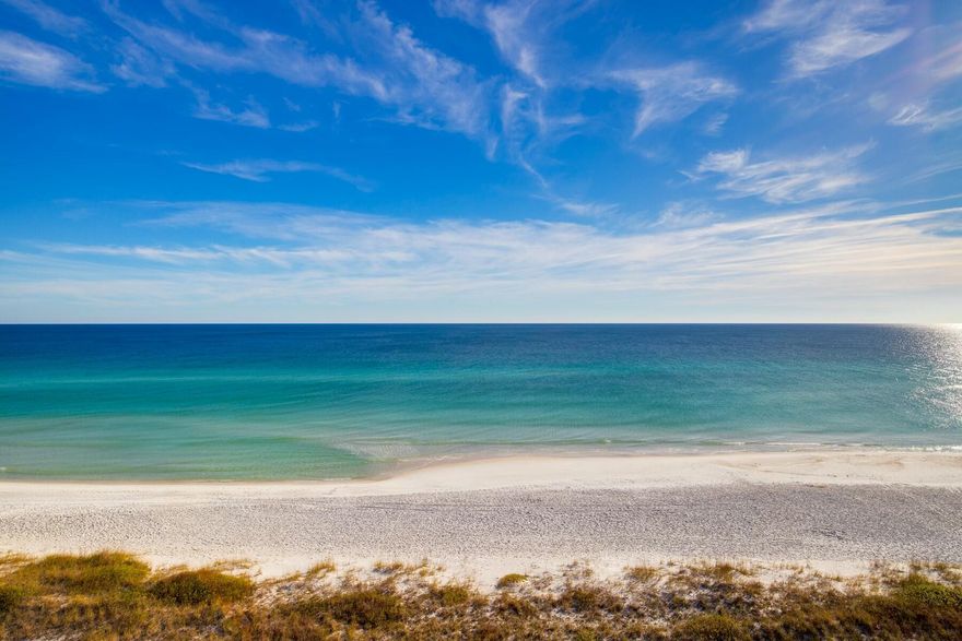 Gulf front condo on the 7th floor with panoramic views of emerald waters. Breathtaking sunrise and sunsets from your private balcony. Fully furnished with tile floors throughout, Corian countertops, stackable washer/dryer, master bath garden tub, and hurricane shutters.  Pool, grills, beach access, and picnic area are some of the amenities available for you and your guests to enjoy! Whether considering a vacation property, investment, or full-time residence, this property is one to see.