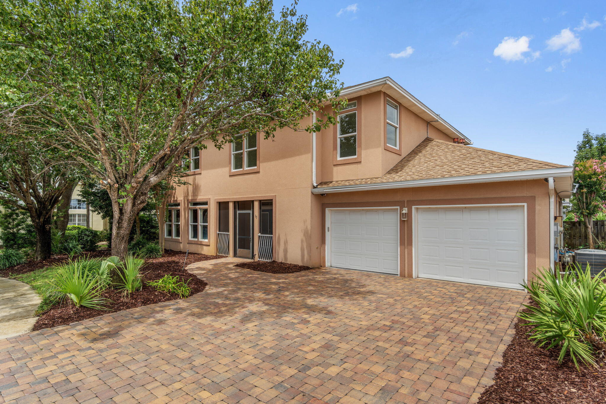 Welcome to 60 Sagris Cove in Avalon Beach Estates, a sought-after Gulf-front community with 500' of private gated beach access, seasonally heated pool, tennis, and pickleball courts. Never rented, this custom-built home with over 2800 square feet boasts 3 bedrooms PLUS two oversized flex rooms -- one upstairs and one downstairs, ideal for guests or multi-use space. Features include transom windows, crown molding, chef's kitchen, whole-home generator, spacious primary ensuite. Many recent updates for 2025: BRAND NEW paint, LVP floors, water heater, and refrigerator. Roof (2022), *two* HVAC units (2016), paid-off solar panels. Screened front and back porch, privacy-fenced yard on a cul-de-sac in Flood Zone X. STR allowed. No thru traffic to 98. Your blank canvas on the beach awaits!