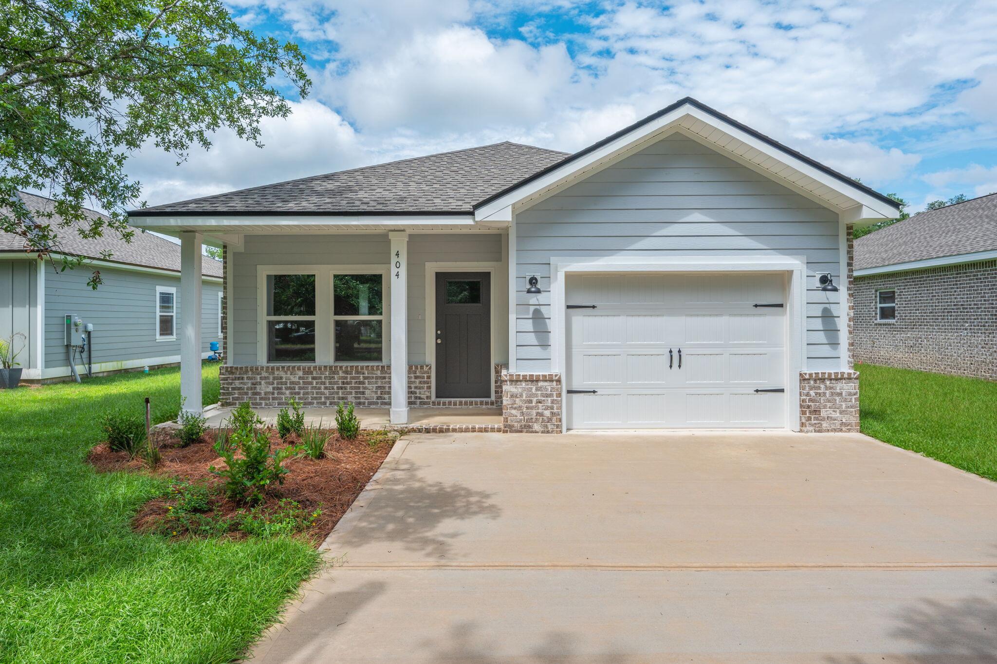 CRAFTSMAN STYLE NEW HOME - ONE OF THE FEW REMAINING HOMES featuring front and rear porches, fully fenced and landscaped yard with sprinkler system. Raised ceilings, recessed lighting, luxury vinyl plank flooring, tile shower in owners' bath, quartz or granite countertops and white shaker style cabinets. Large walk-in pantry plus work island w/bar seating. Early July completion, seller will contribute up to $10,000 towards buyers closing costs and/or prepaids and/or rate buydown with preferred lenders-call for details. Photos of similar completed home elevation, interior/exterior colors subject to change.