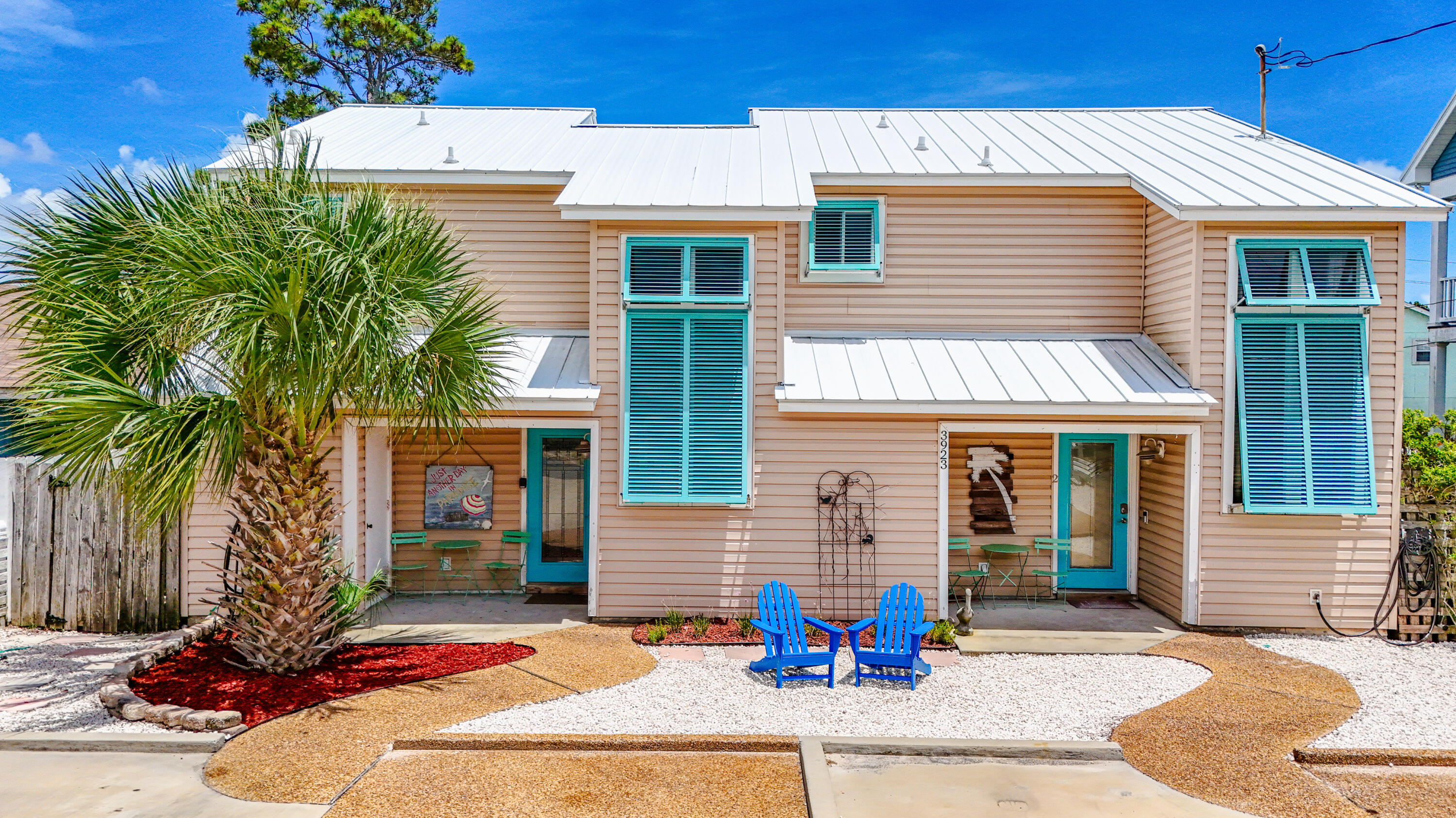 AMAZING duplex w/ a multitude of opportunities & options! Make them both a vacation rental or full time rentals or live on one side & rent the other side, the options are up to you. Unit 1 is a 1 Bedroom with a loft & 1 1/2 bathrooms; Unit 2 is a 2 bedroom, 2 bathroom. Both units have upper & lower decks for great outdoor living. The property is fenced w/ a fence between the units. Unit 2 has an adorable little out building: which could be a workshop, art studio, craft room or a bunk room. Location is perfect!! You can easily get to the beach, lagoon, marina & St Andrews State Park in a matter of minutes. Enjoy great options for entertainment, dining, shopping & excursions. This property is just a few miles to Publix Sports Complex & Pier Park. Yet, set back for some quiet time!
