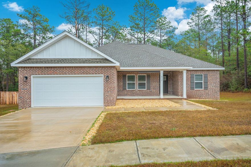 Stop the car--this quality home checks all the boxes! Located less than 10 minutes from North Crestview, this move-in-ready 4BR/2BA brick home built in 2023 sits on a spacious .55-acre lot. From the charming covered front porch to the bright, open living space, this home is perfect for both everyday living and entertaining. The split-bedroom layout offers a private primary suite, plus three additional bedrooms for guests, family, or a home office. Step outside to a covered back porch overlooking a peaceful backyard--ideal for morning coffee or summer cookouts. Enjoy neighborhood perks like sidewalks, walking trails, and a large community pool. Don't miss this one--schedule your showing today!